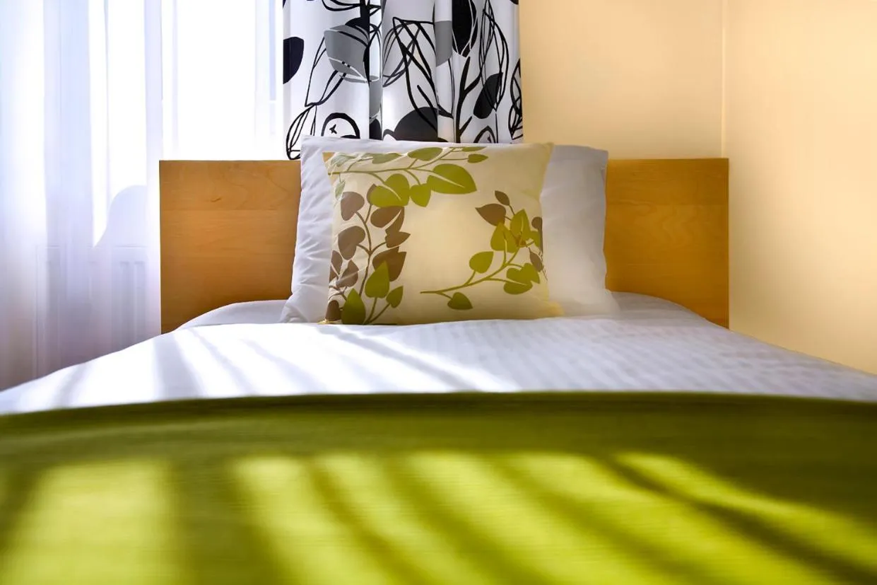 Bed in Apartamenty Pomarańczarnia