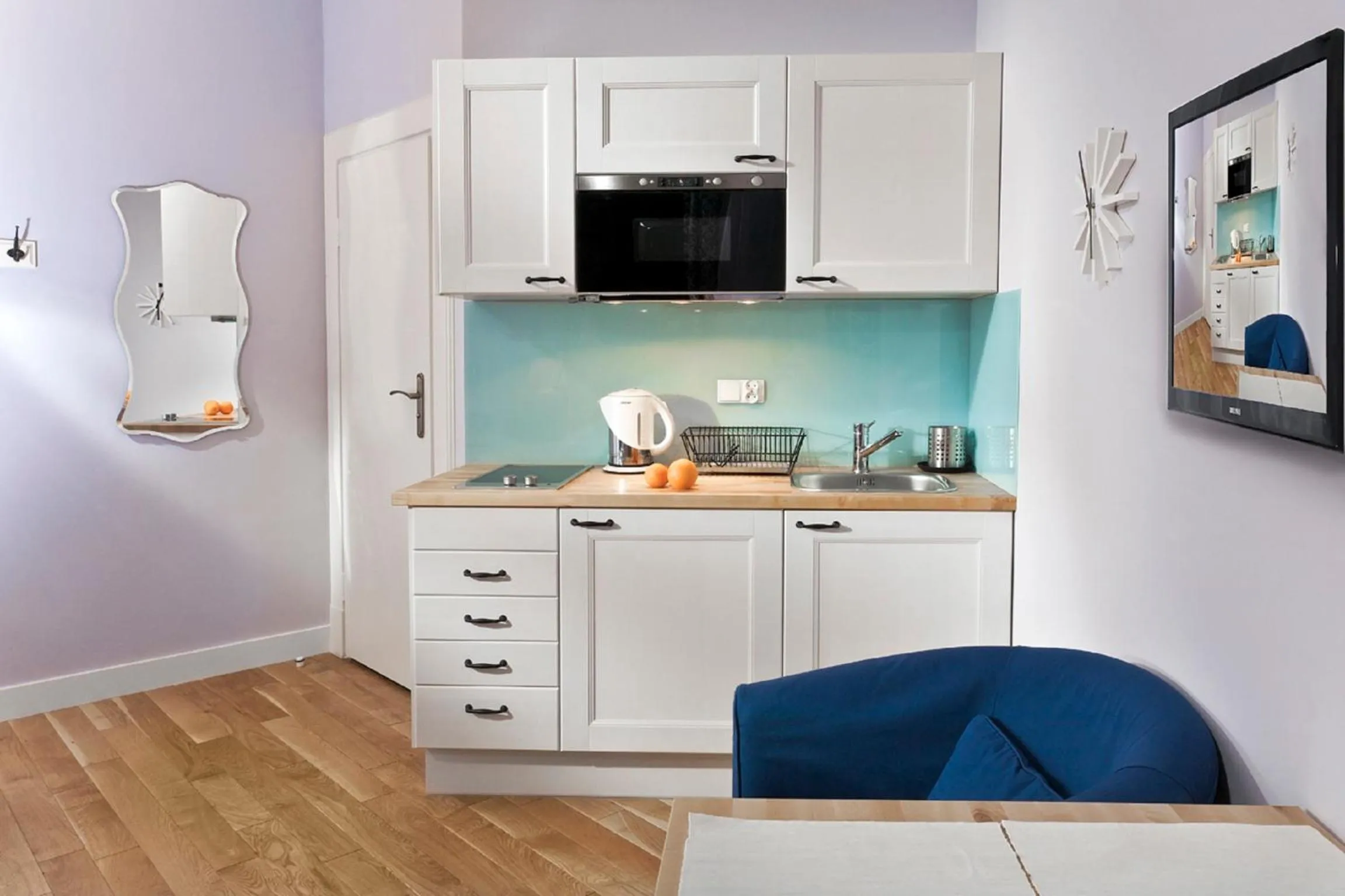Kitchen or kitchenette in Apartamenty Pomarańczarnia