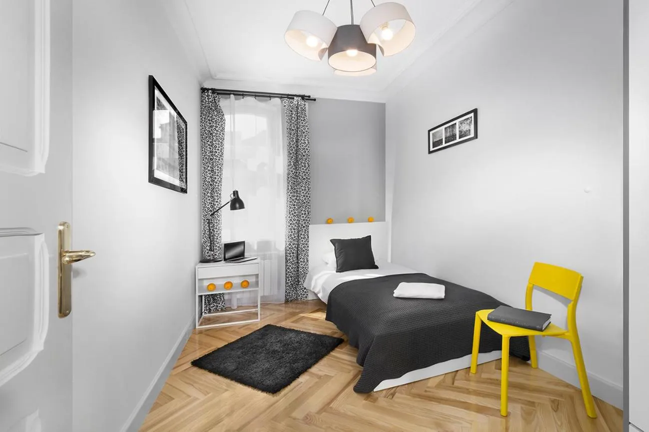 Bed in Apartamenty Pomarańczarnia
