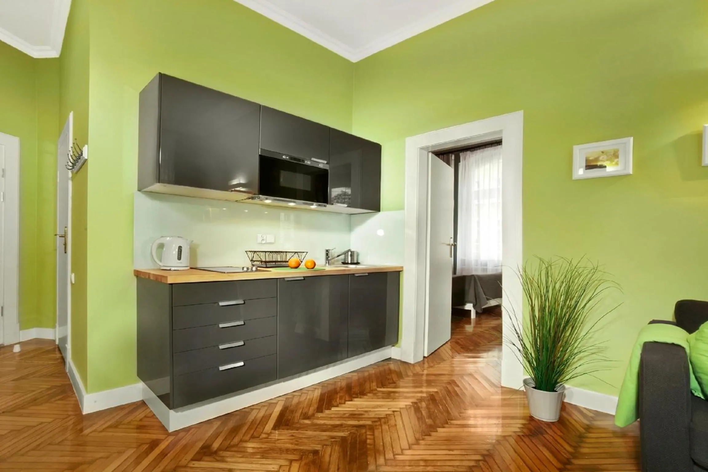 Kitchen or kitchenette in Apartamenty Pomarańczarnia