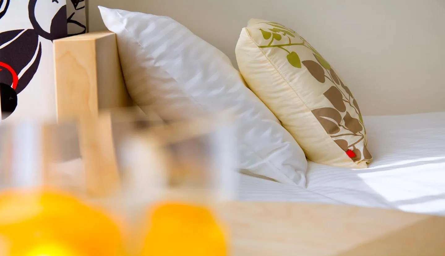 Bed in Apartamenty Pomarańczarnia