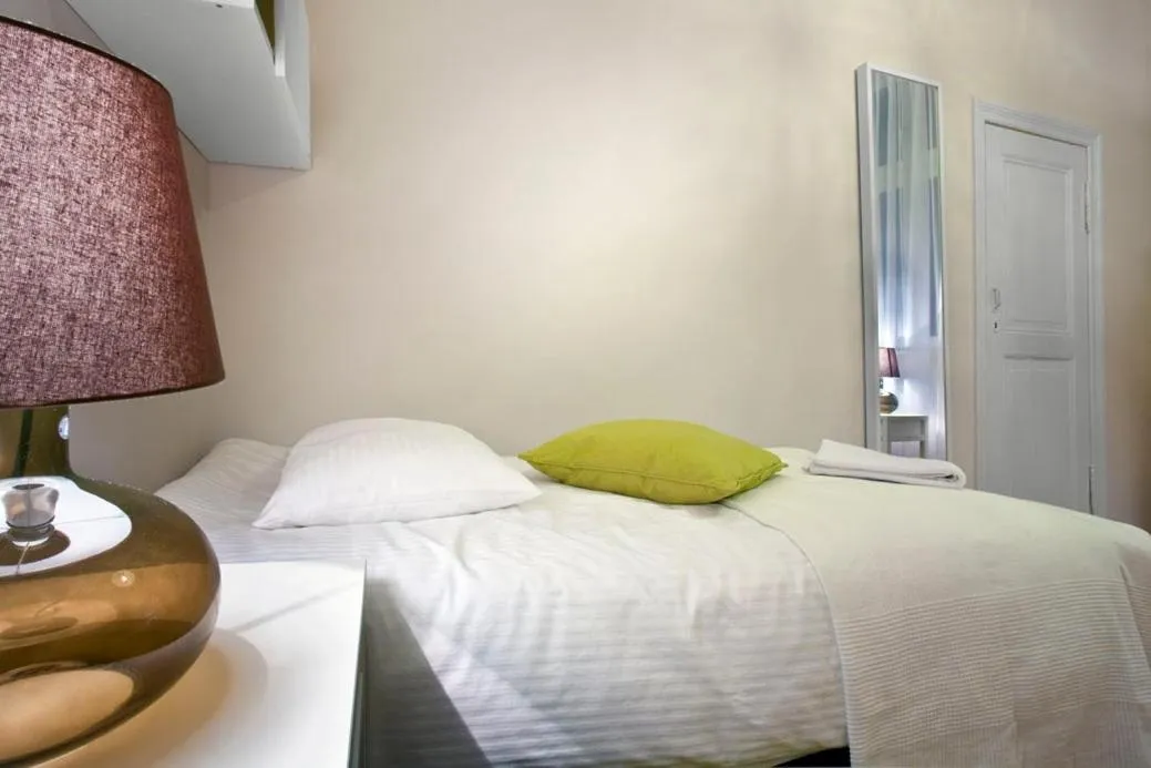 Bed in Apartamenty Pomarańczarnia