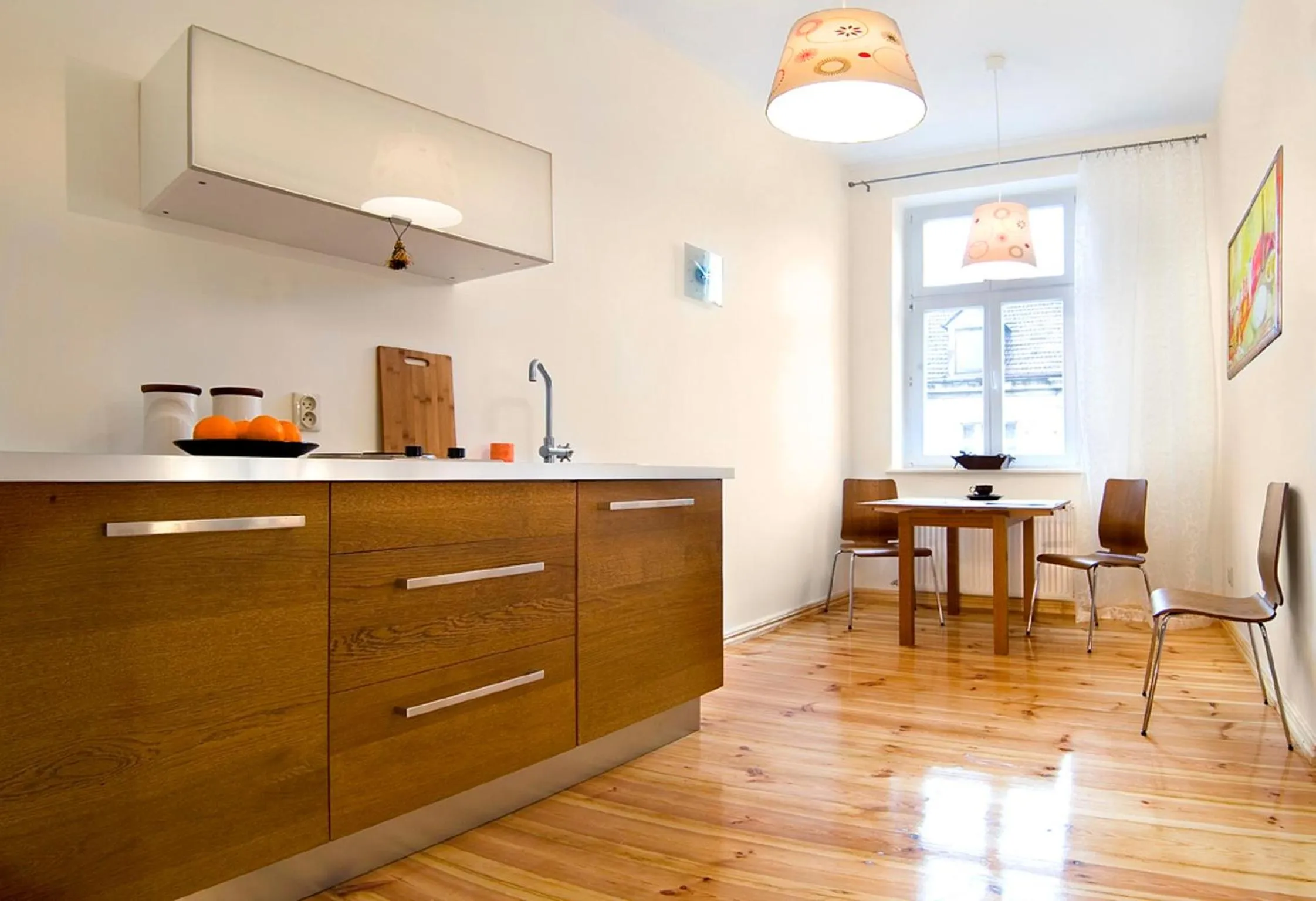 Kitchen or kitchenette in Apartamenty Pomarańczarnia