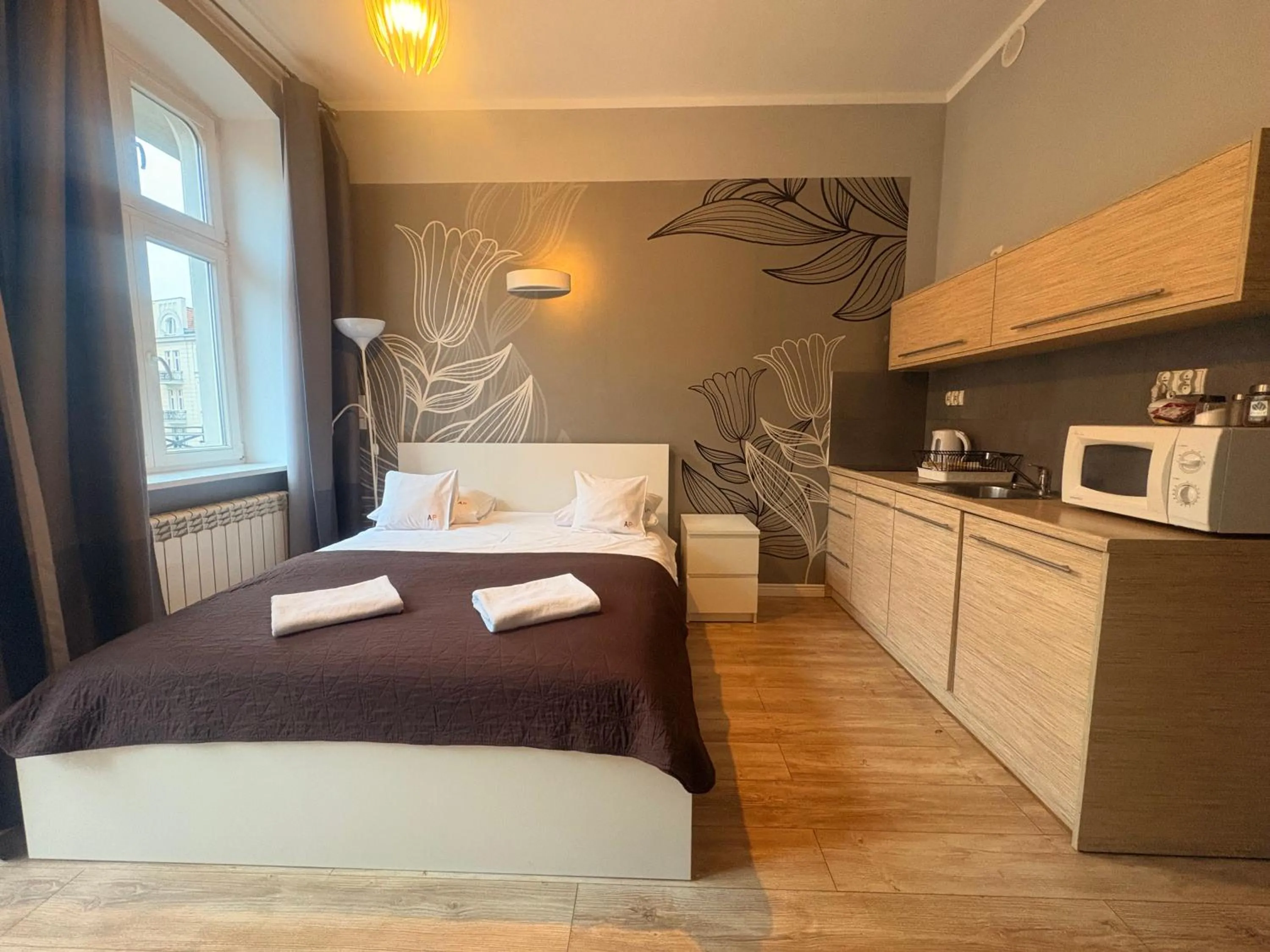 Bed in Apartamenty Pomarańczarnia