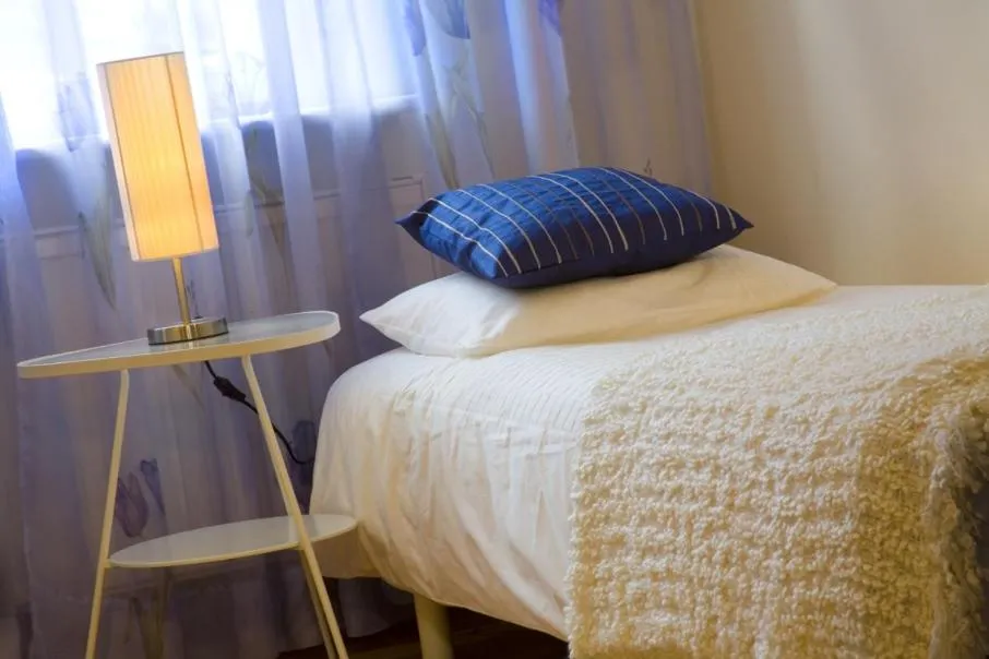 Bed in Apartamenty Pomarańczarnia