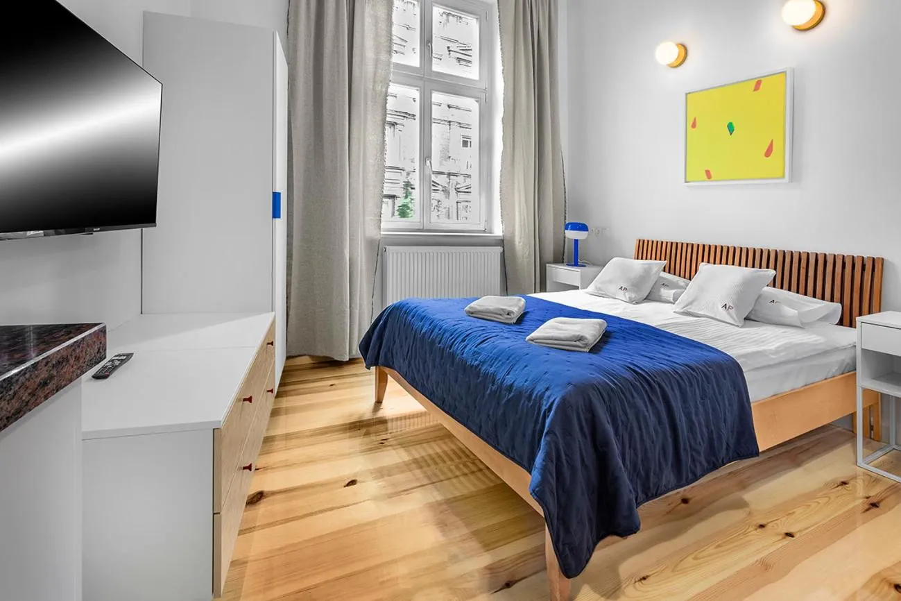 Bed in Apartamenty Pomarańczarnia