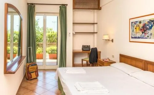 Bed in Hotel Baia Del Sole