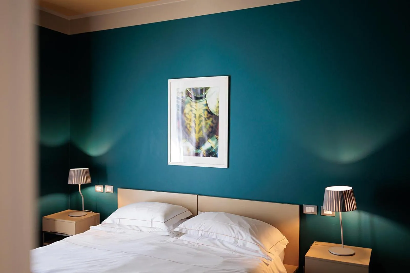 Bed in Escalus Luxury Suites Verona