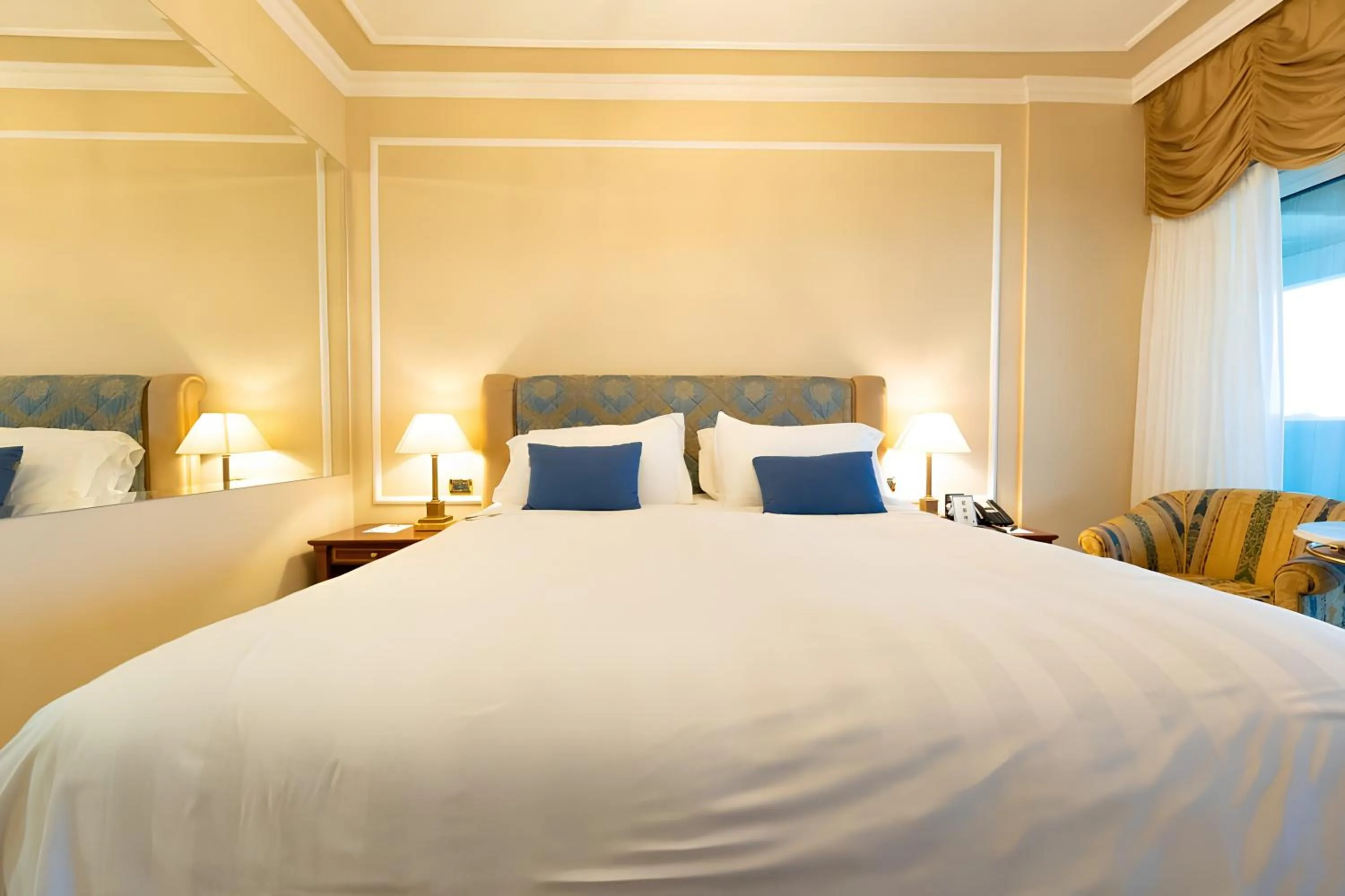 Bed in Grand Hotel Del Mare Resort & Spa