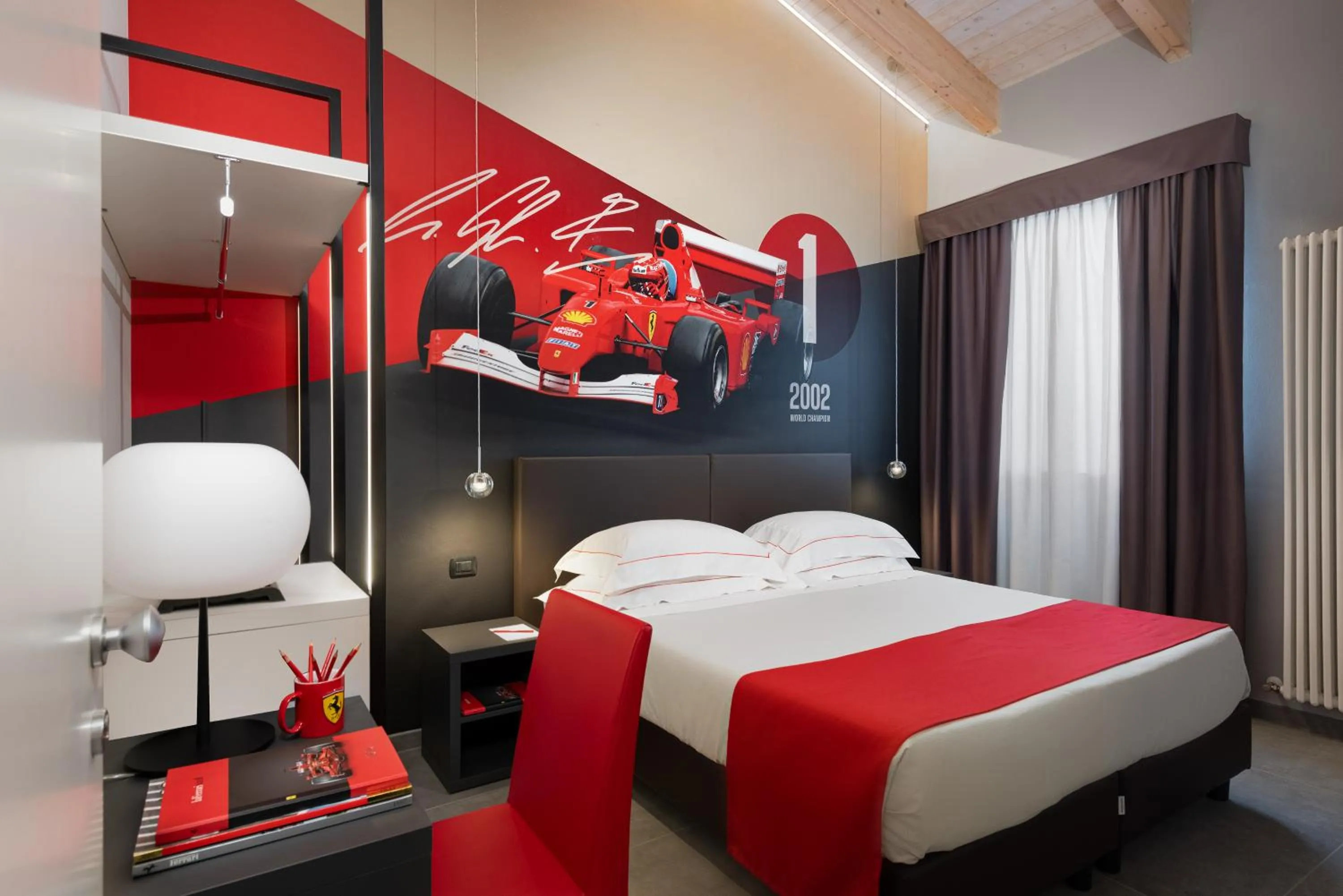 Photo of the whole room, Bed in Hotel Maranello Village