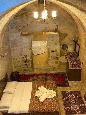 Bed in Ürgüp Inn Cave Hotel