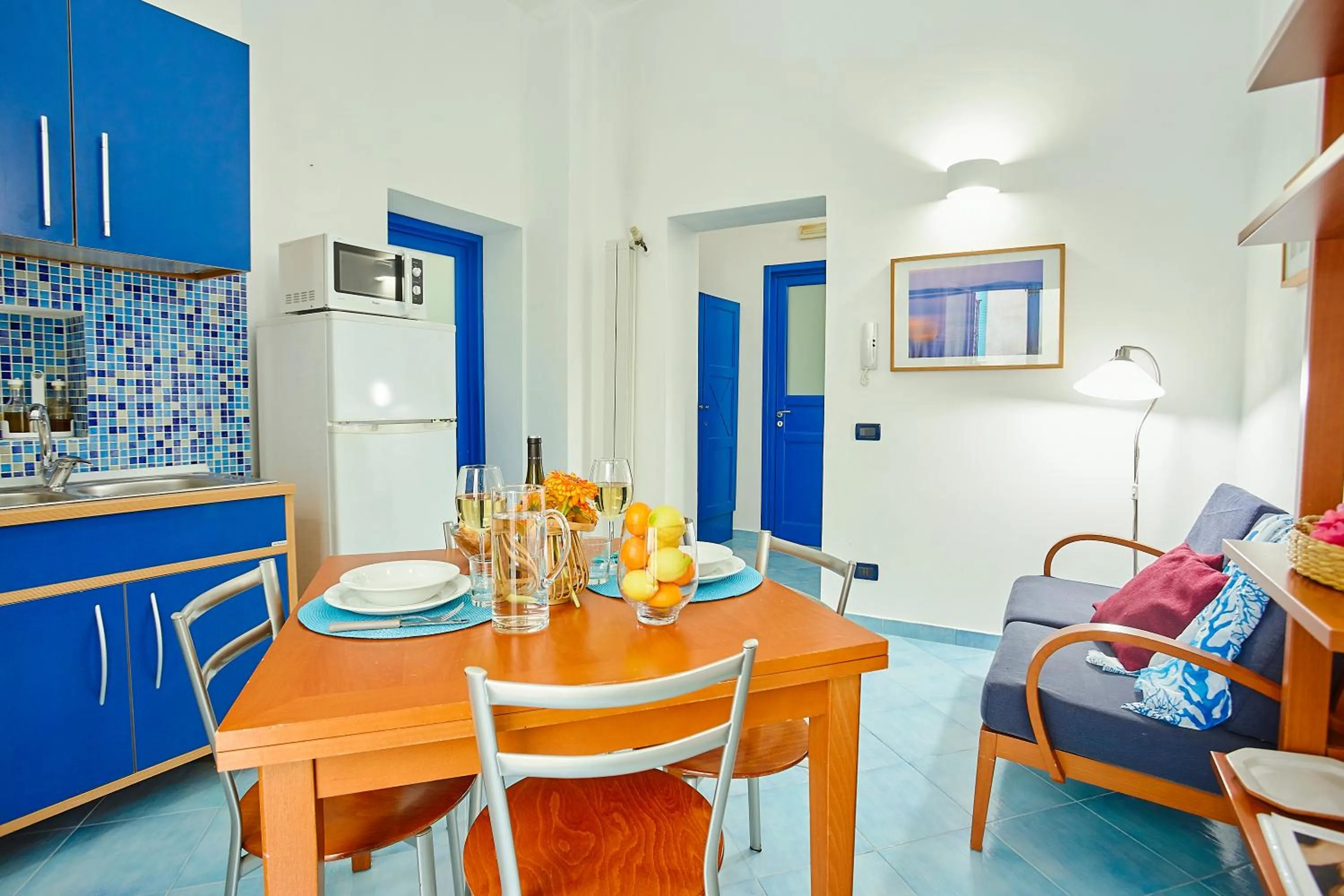 Kitchen or kitchenette in Appartamenti Rosa Dei Venti