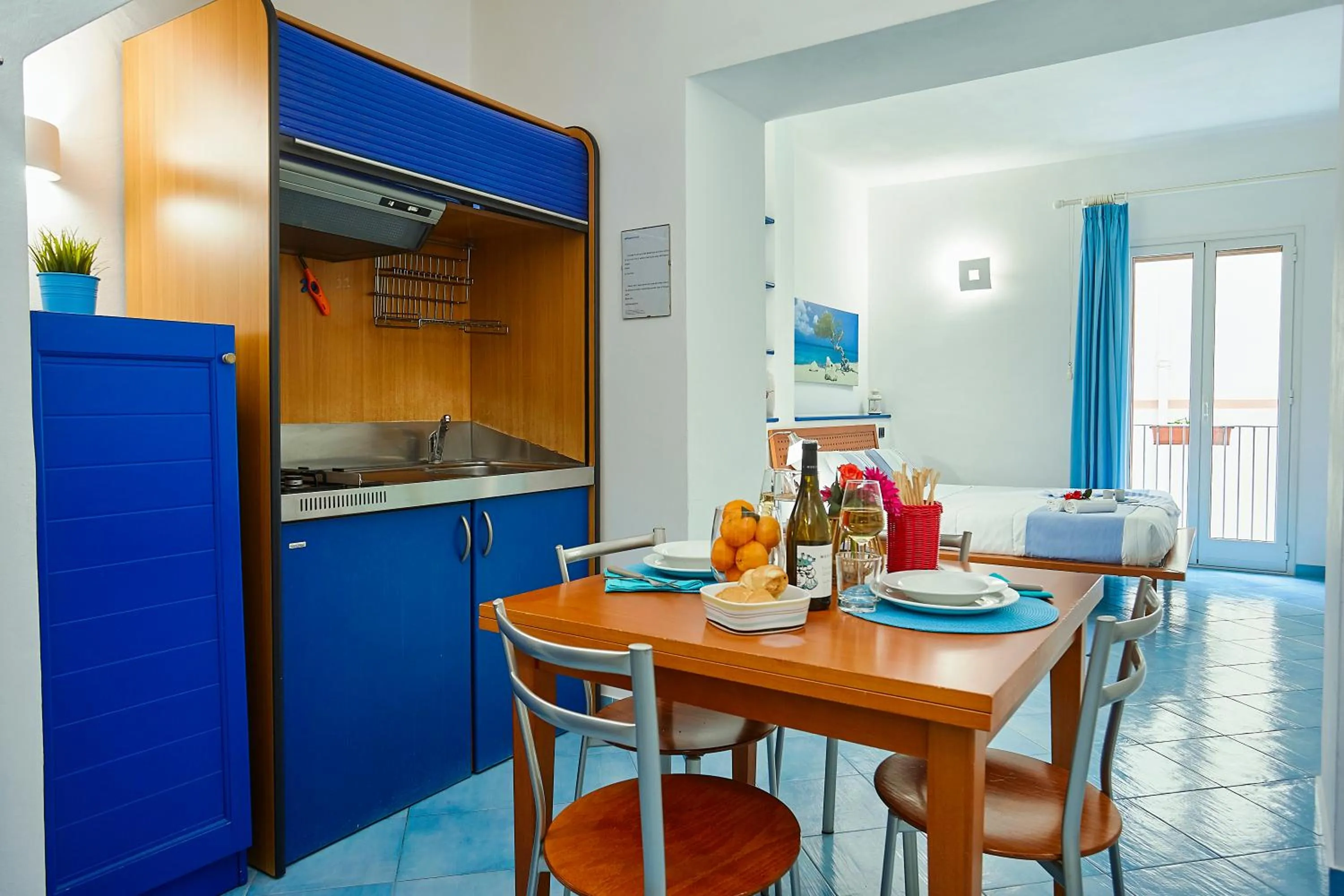 Kitchen or kitchenette in Appartamenti Rosa Dei Venti