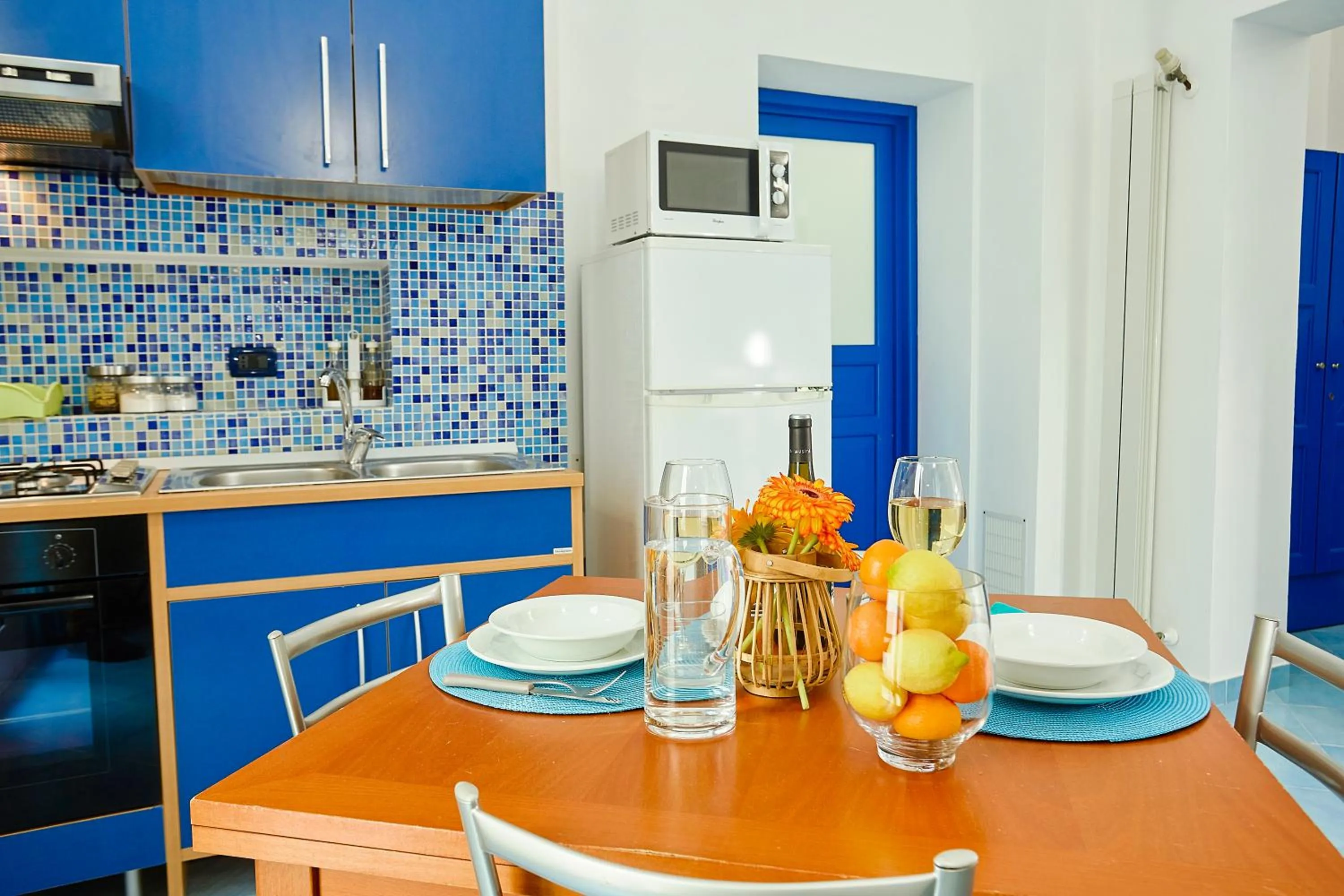 Kitchen or kitchenette in Appartamenti Rosa Dei Venti