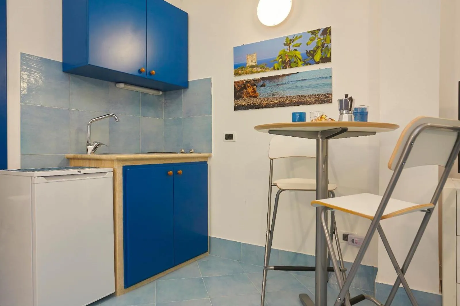 Kitchen or kitchenette in Appartamenti Rosa Dei Venti