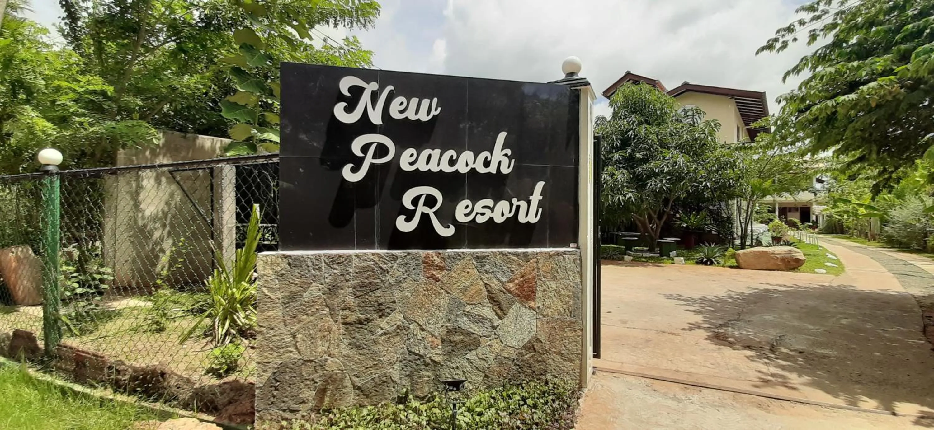 Property logo or sign in New Peacock Resort