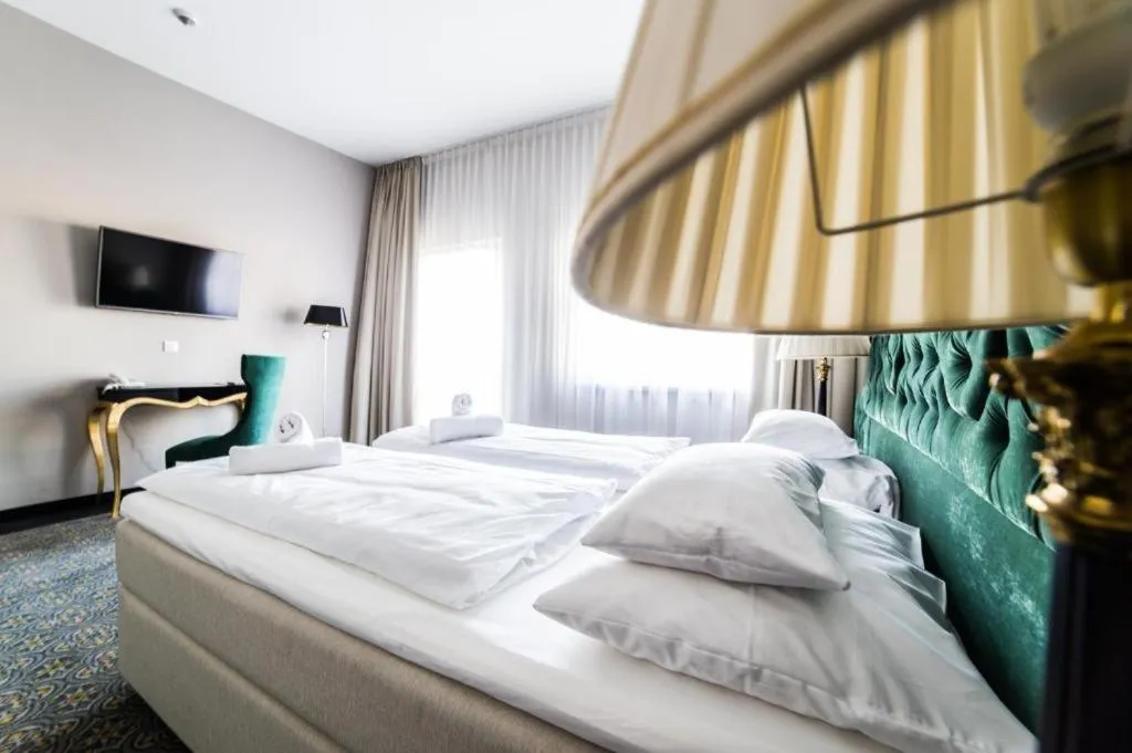 Bed in Pałac na Wodzie Hotel & SPA