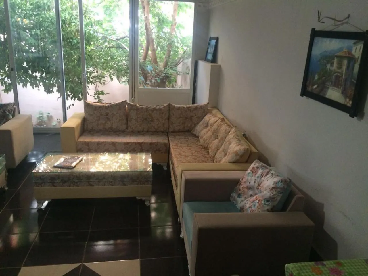 Communal lounge/ TV room in Uyar Palace