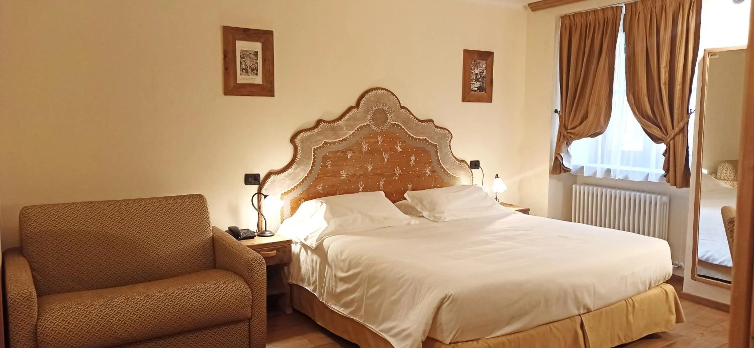 Bed in Le Miramonti Hotel Restaurant & Wellness