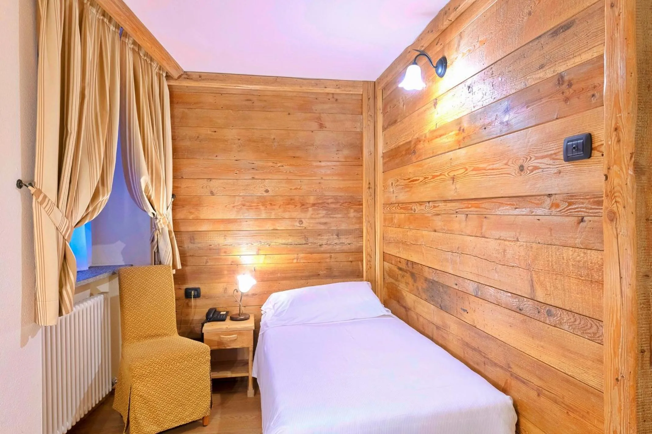 Bed in Le Miramonti Hotel Restaurant & Wellness