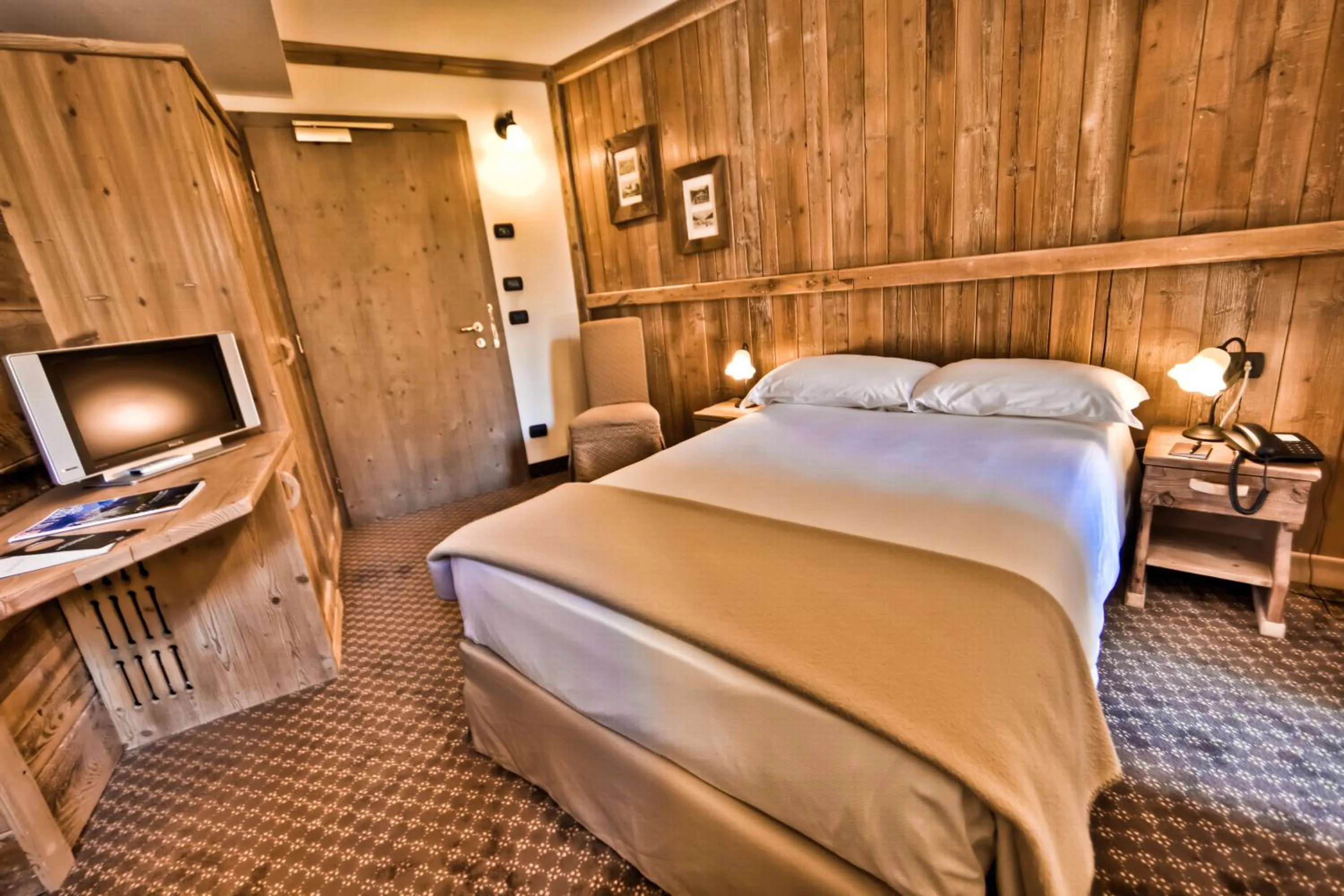 Bed in Le Miramonti Hotel Restaurant & Wellness