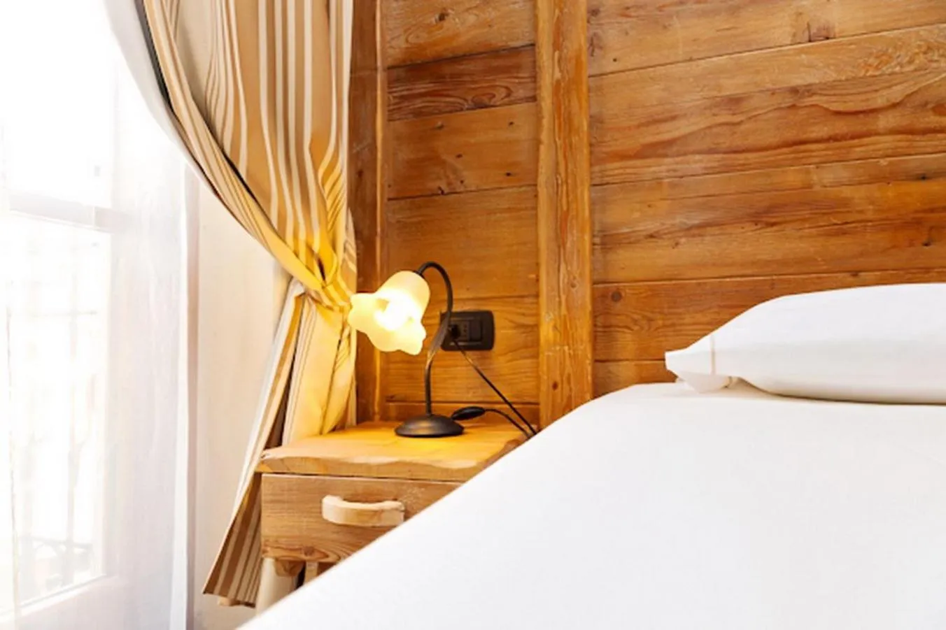 Bed in Le Miramonti Hotel Restaurant & Wellness