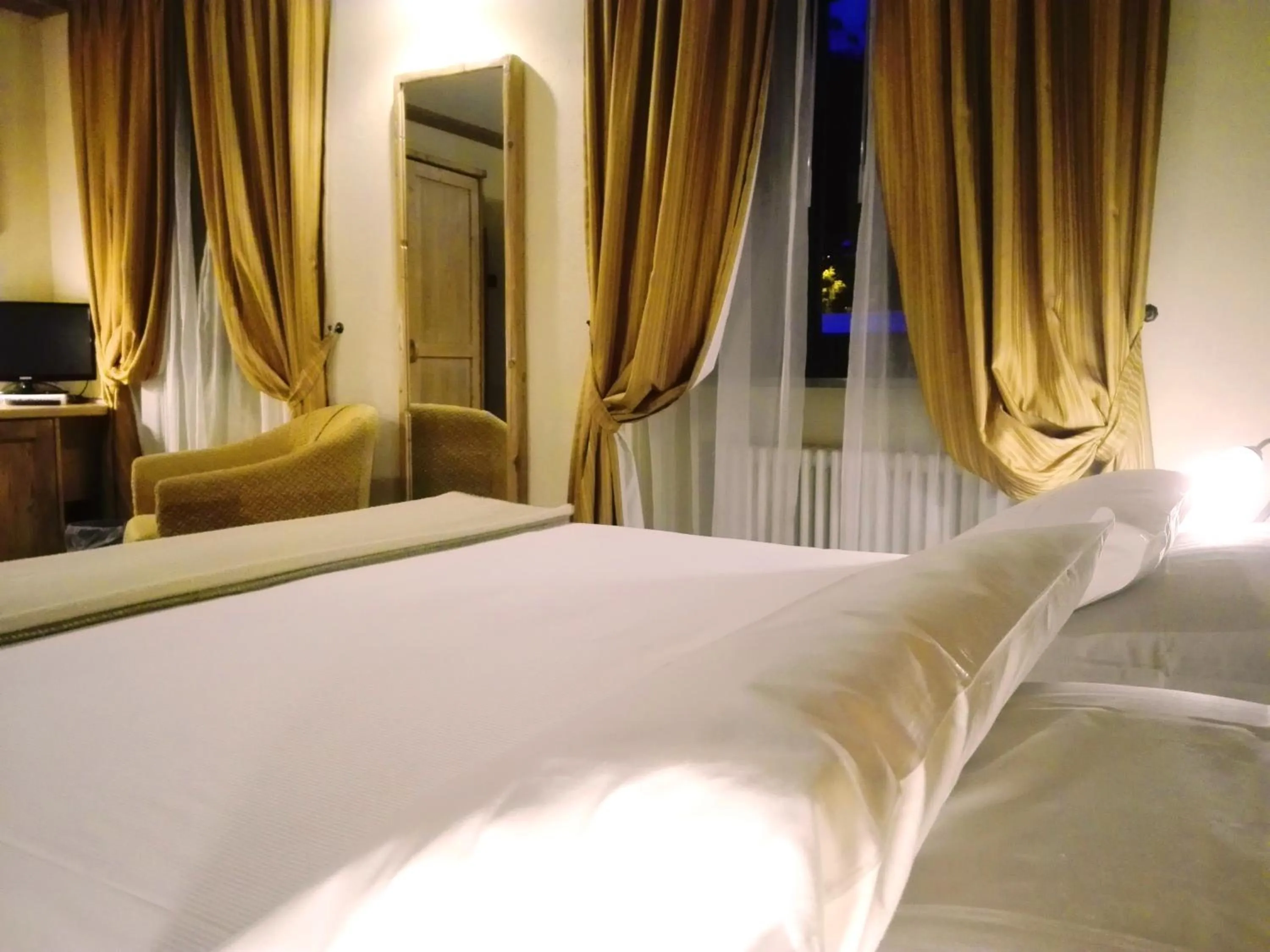 Bed in Le Miramonti Hotel Restaurant & Wellness