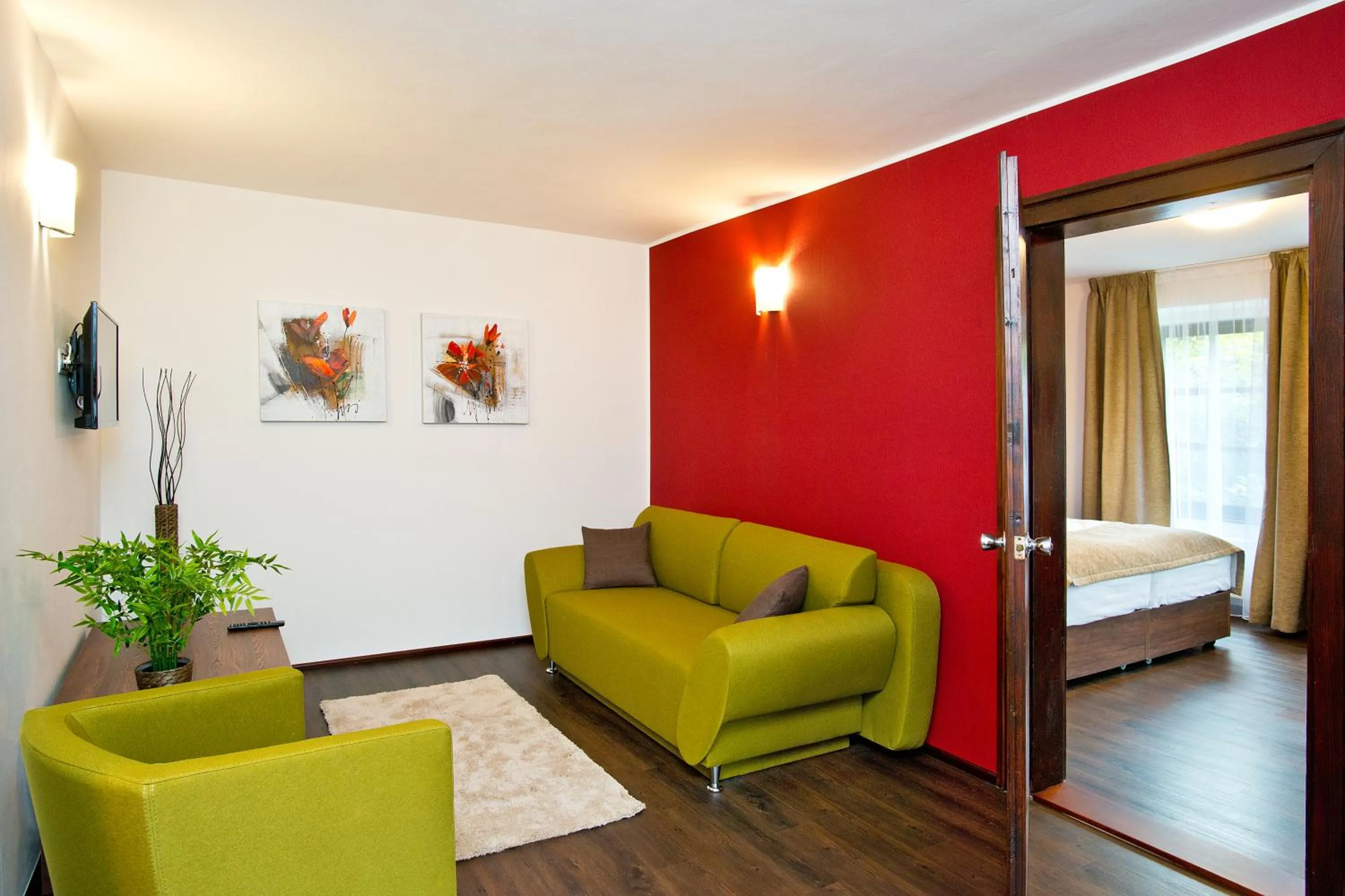 Seating area, Bed in Hotel U Hada Žatec