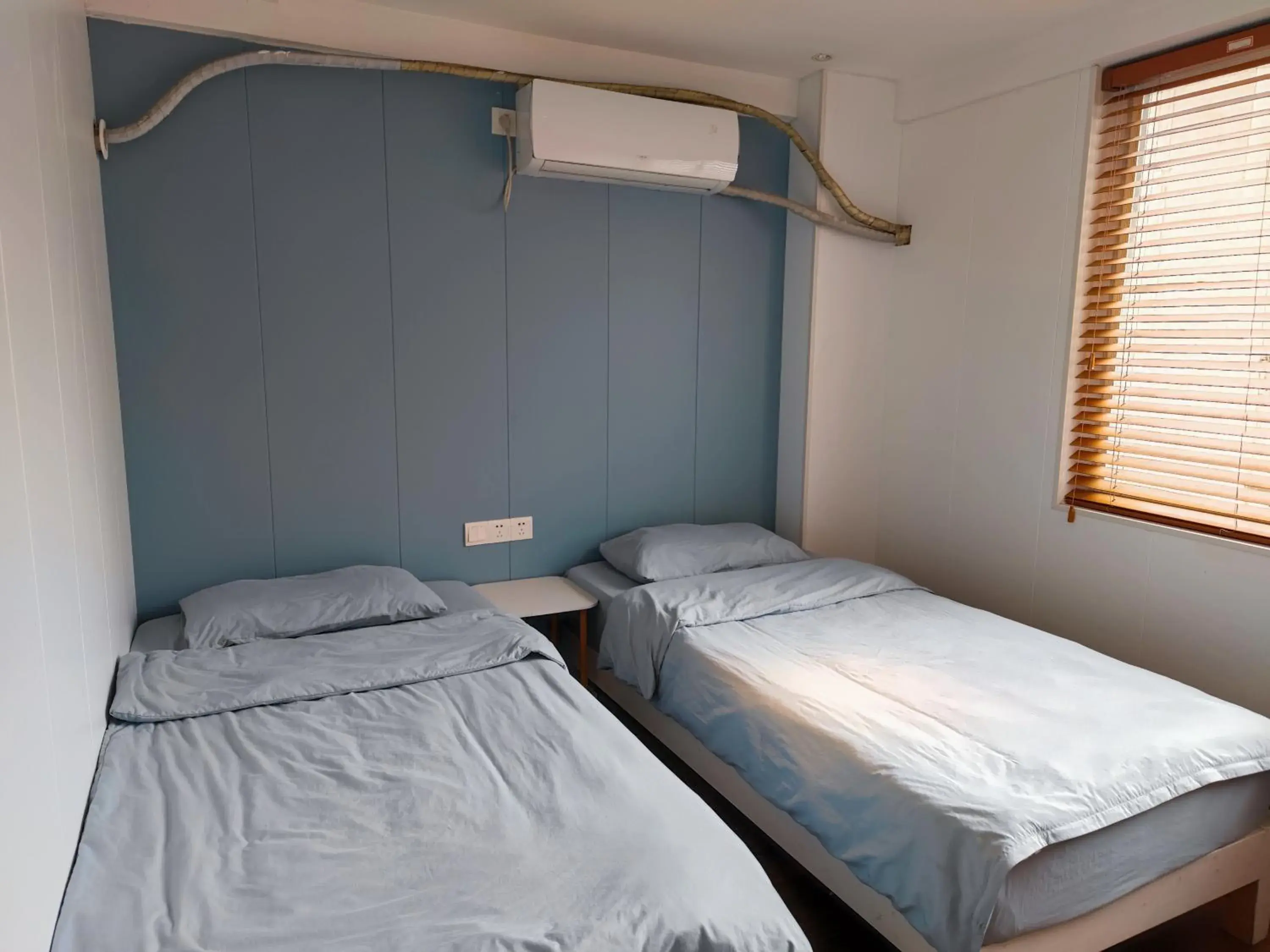 Twin Room with Private Bathroom in Suzhou Blue Gate Youth Hostel Twin Room with Private Bathroom in Suzhou Blue Gate Youth Hostel