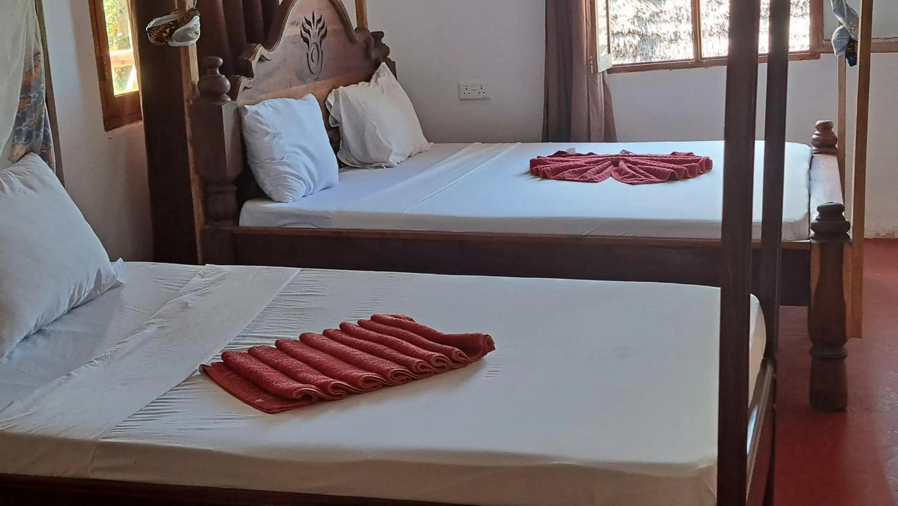 Deluxe Double Room with Side Sea View - single occupancy in Menai Bay Beach Bungalows Deluxe Double Room with Side Sea View - single occupancy in Menai Bay Beach Bungalows