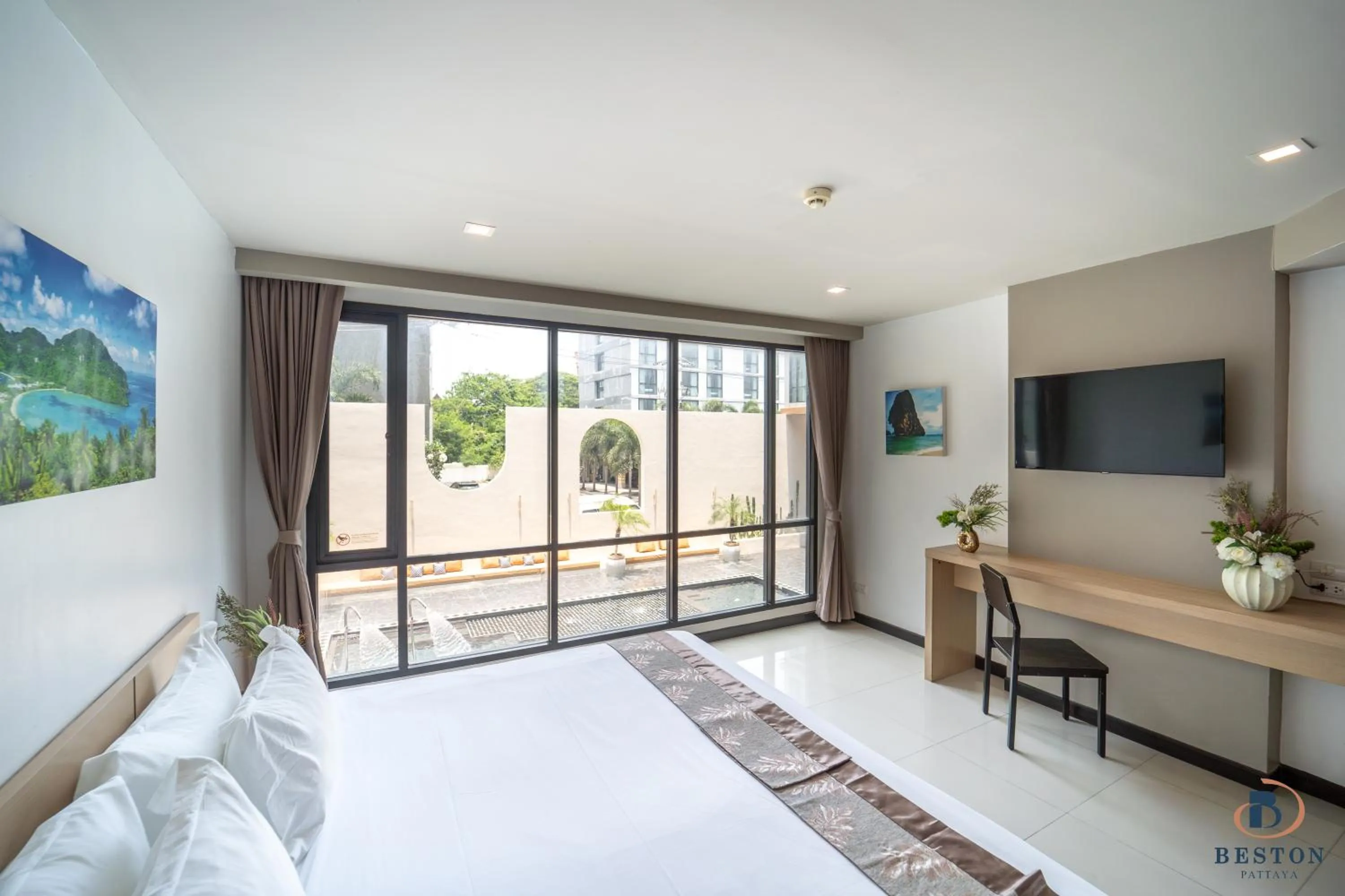 Pool view, Bed in Beston Pattaya - SHA Plus Certified