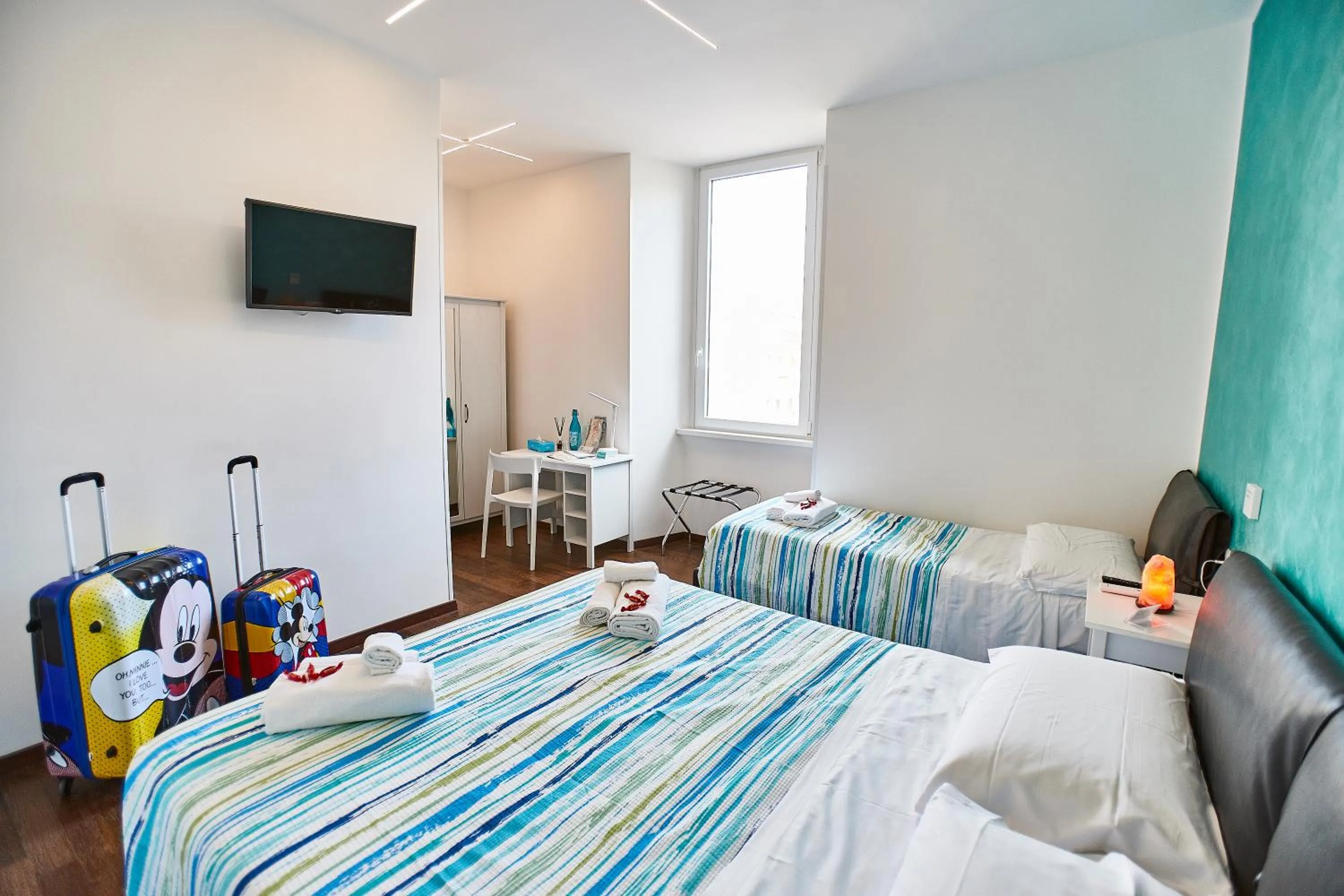 Bed in BB HomEitaly Civitavecchia