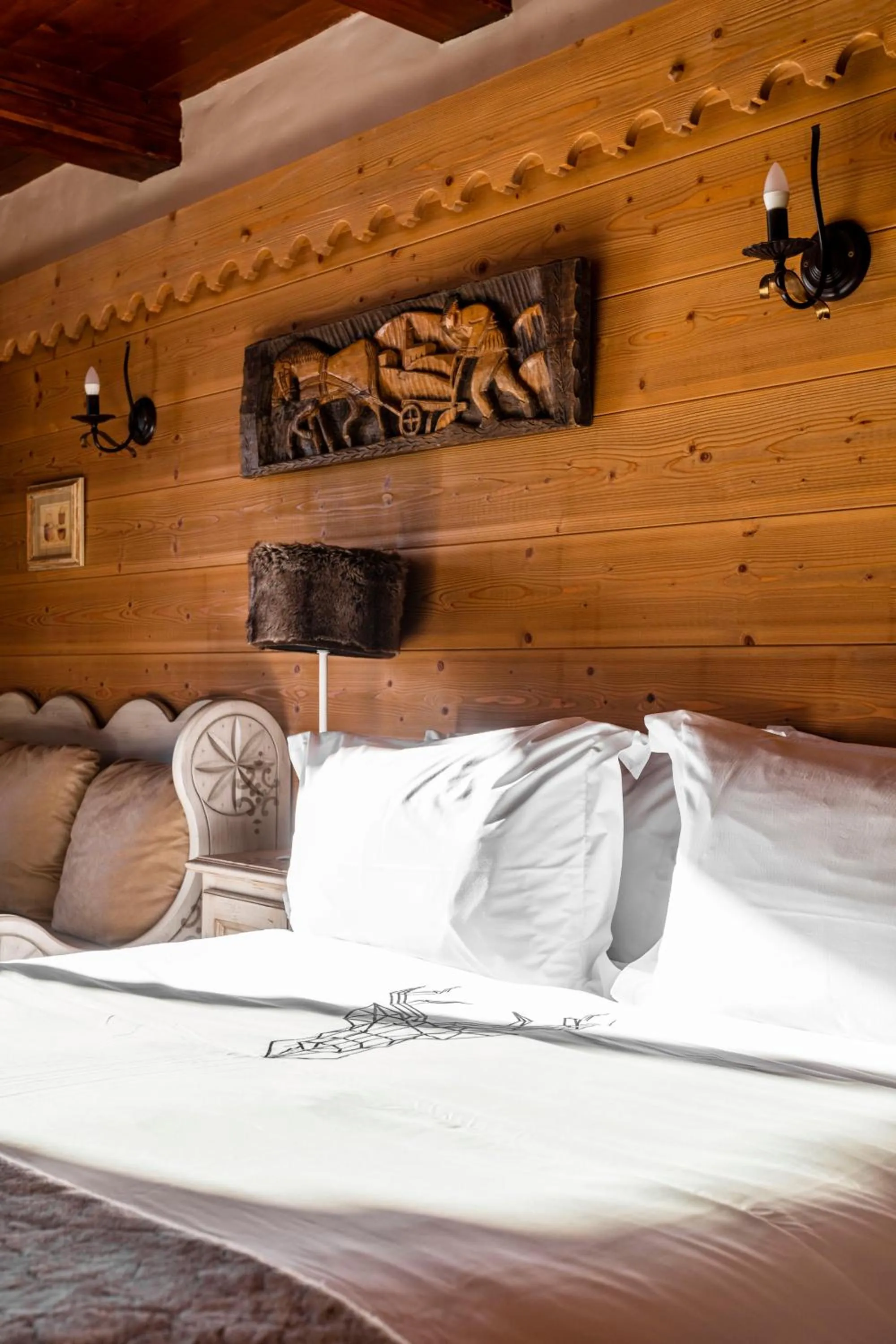 Bed in Hôtel les Campanules by Les Etincelles