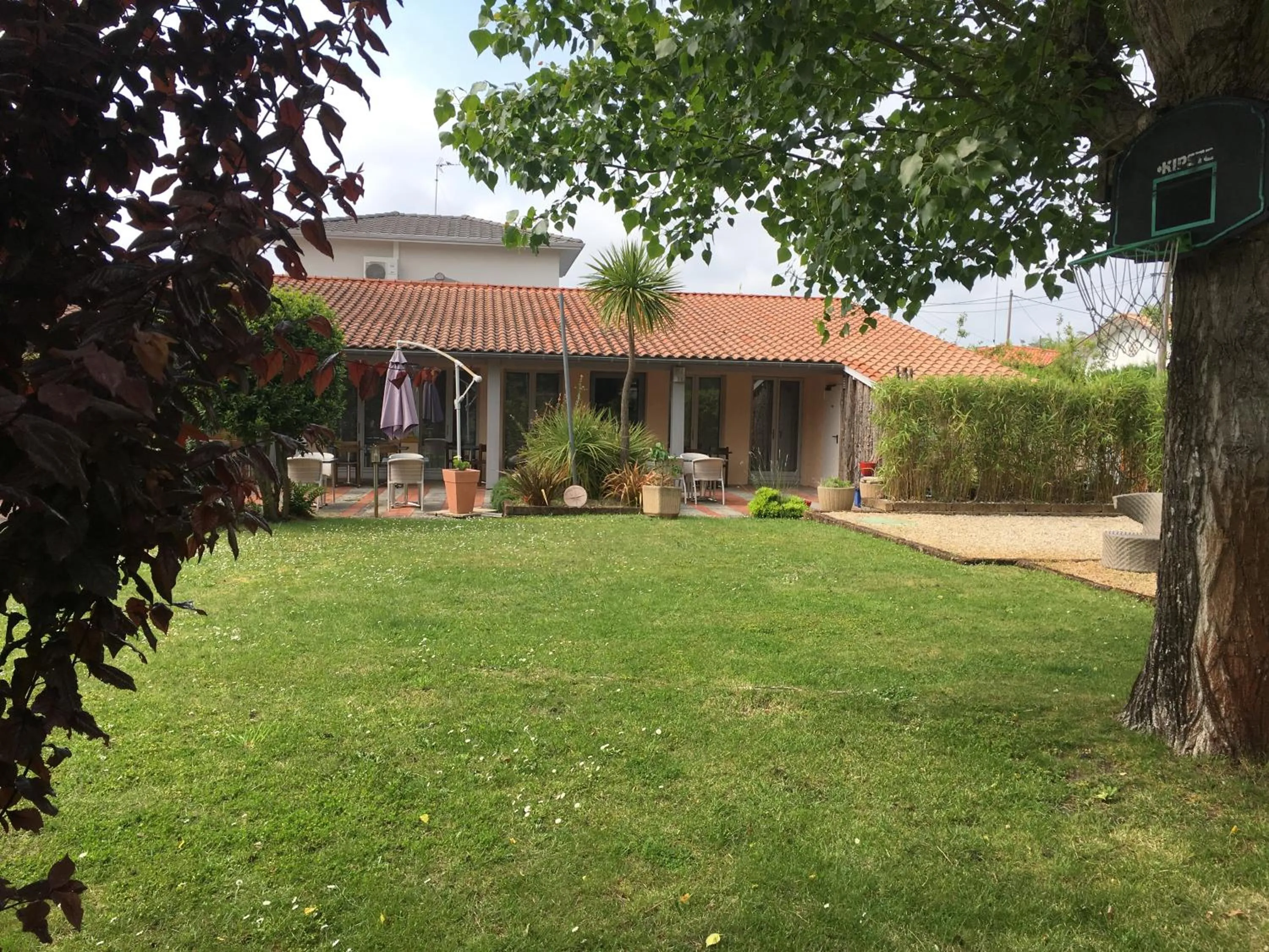 Garden in LOGIS HOTELS - Hôtel et Restaurant L'Océana