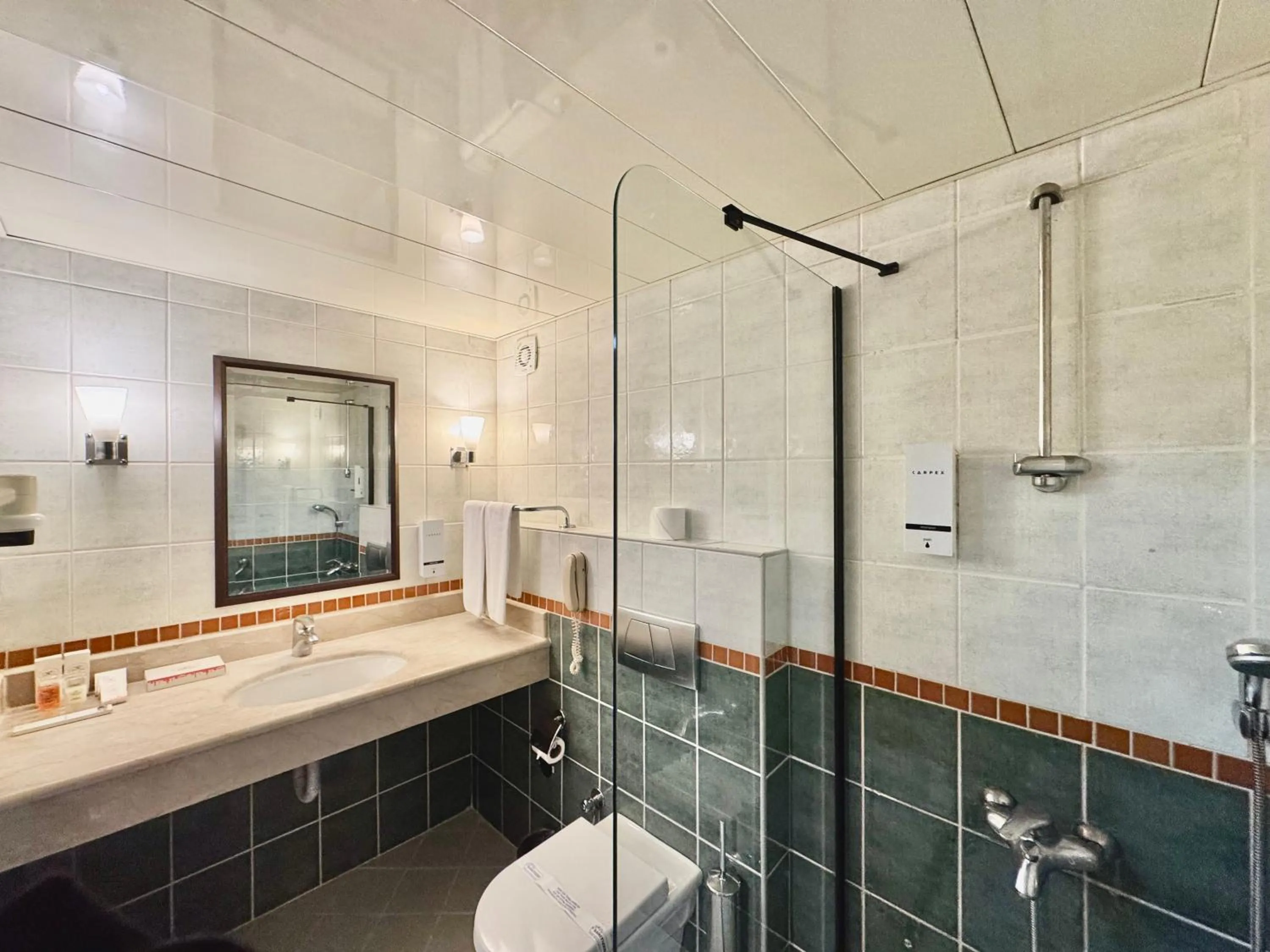 Bathroom in Best Western Plus Khan Hotel