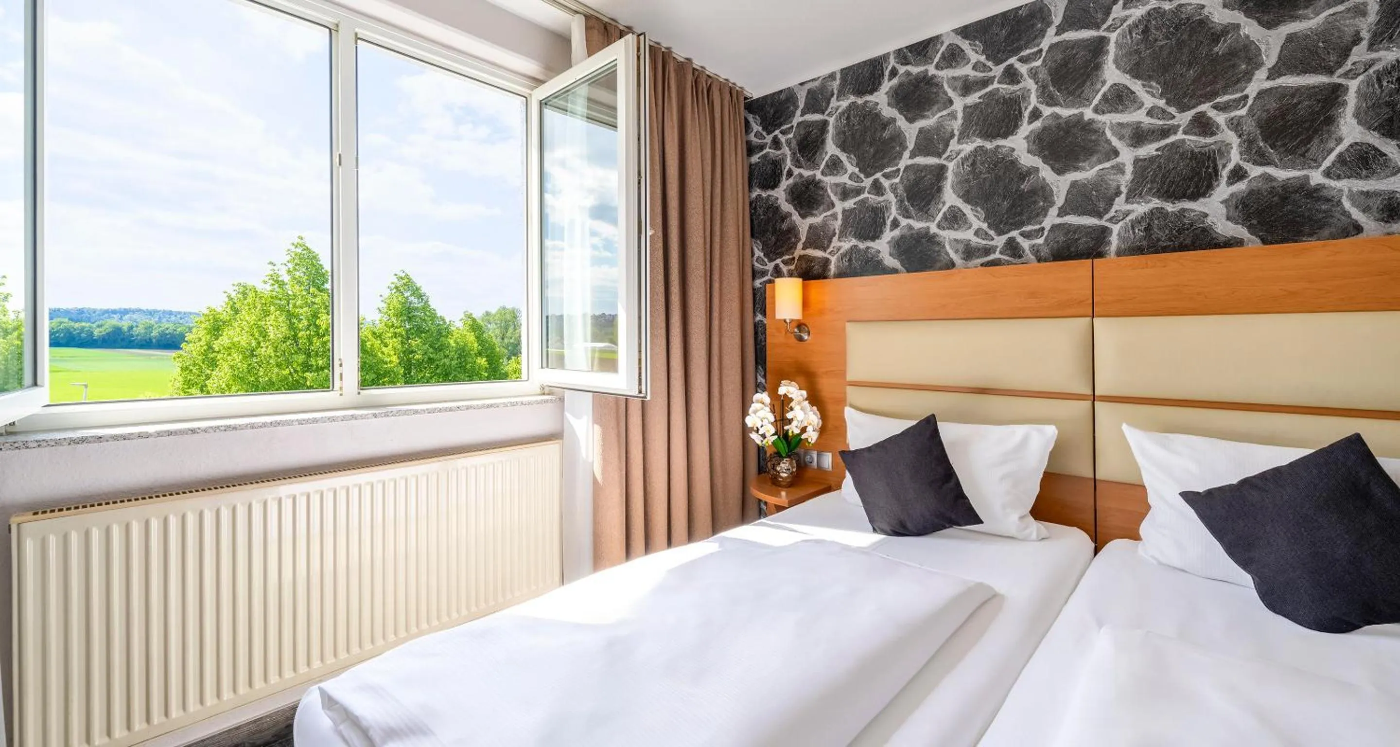 Photo of the whole room, Bed in PLAZA INN Stuttgart Airport Messe