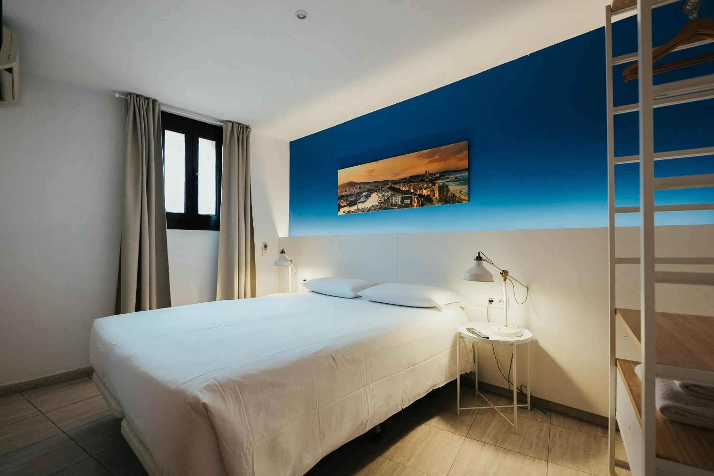 Bed in Ramblas Apartments