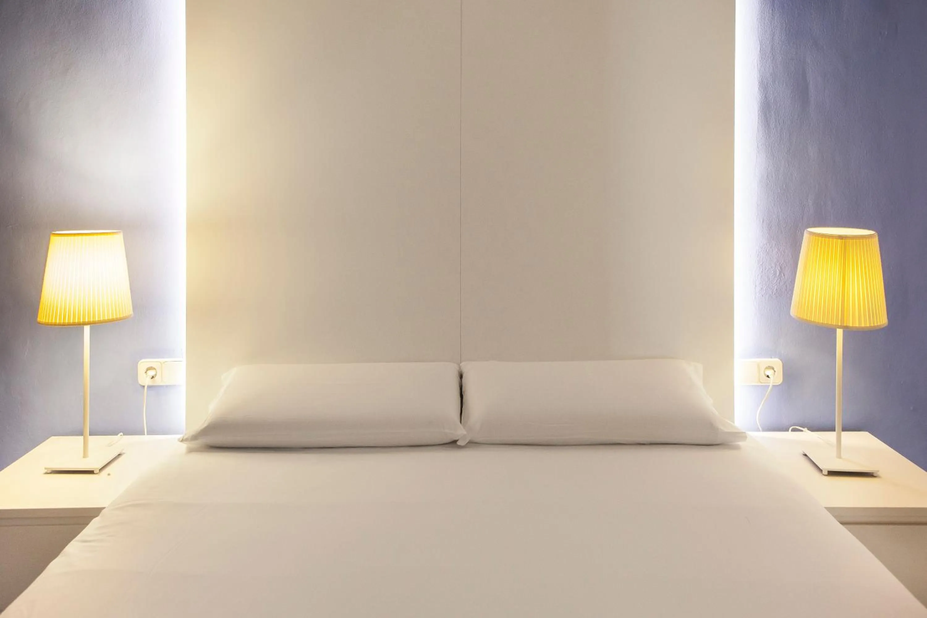 Bed in Ramblas Apartments