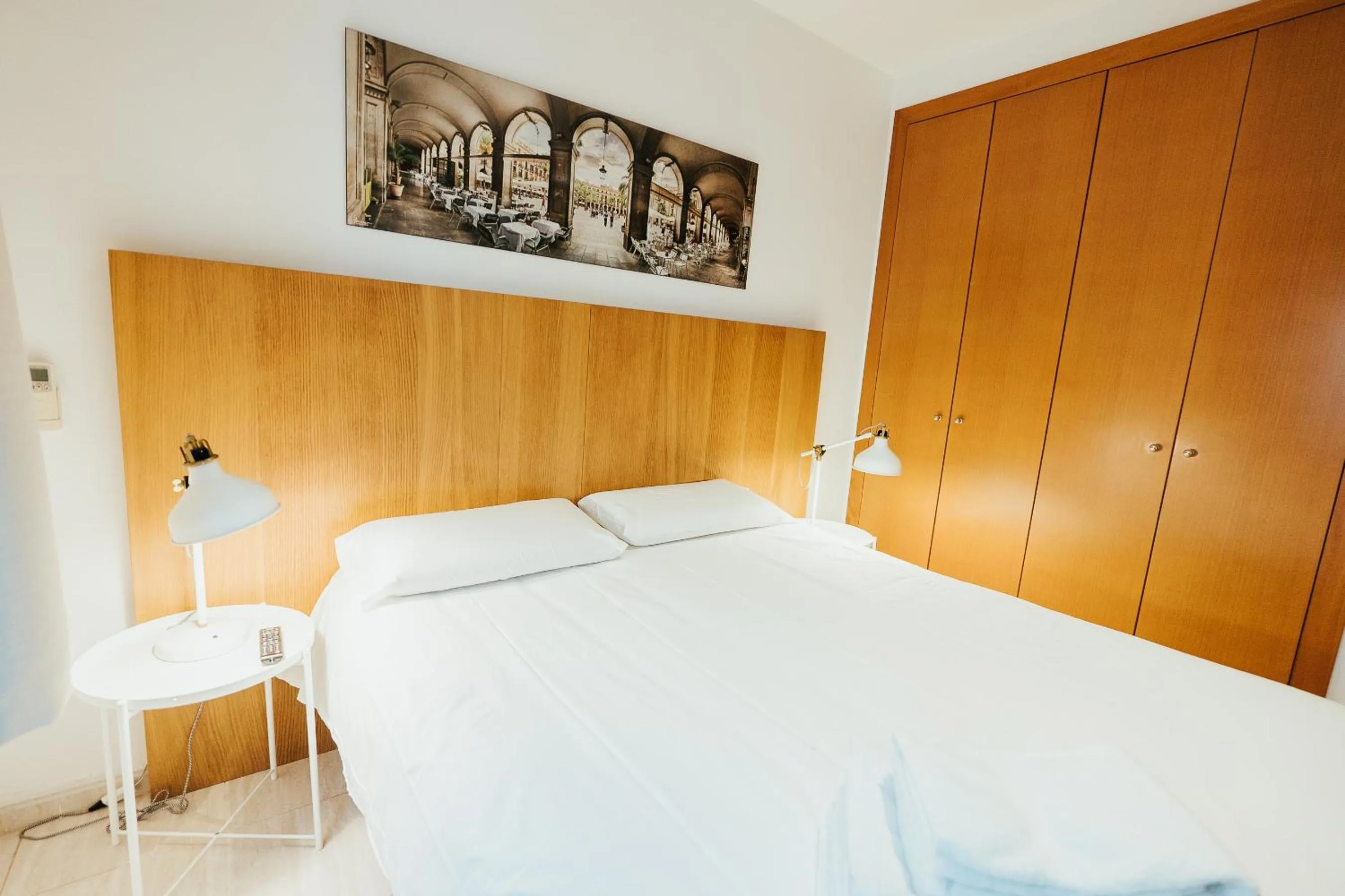 Bed in Ramblas Apartments