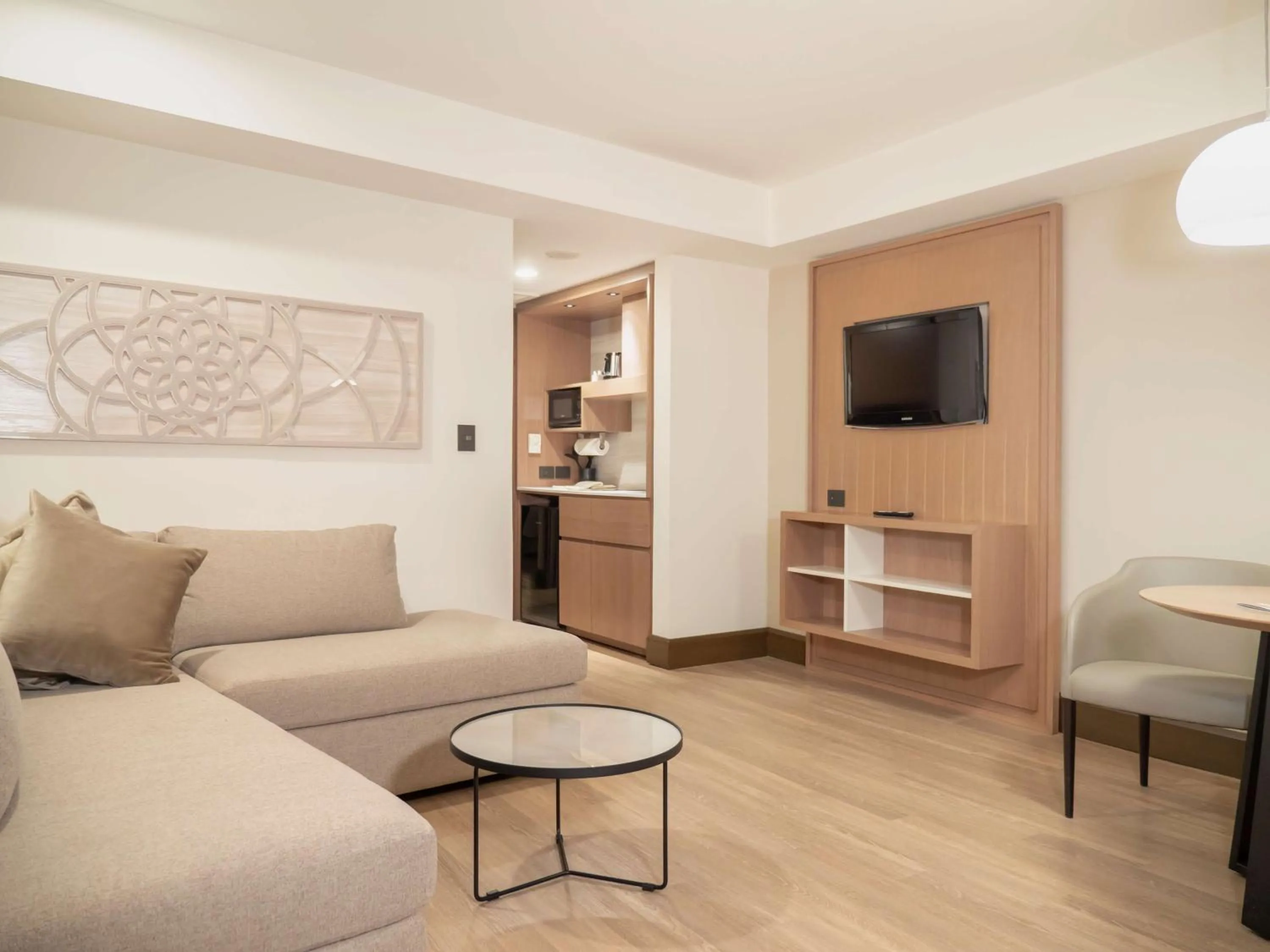 Living room in MS Milenium Monterrey Curio Collection by Hilton