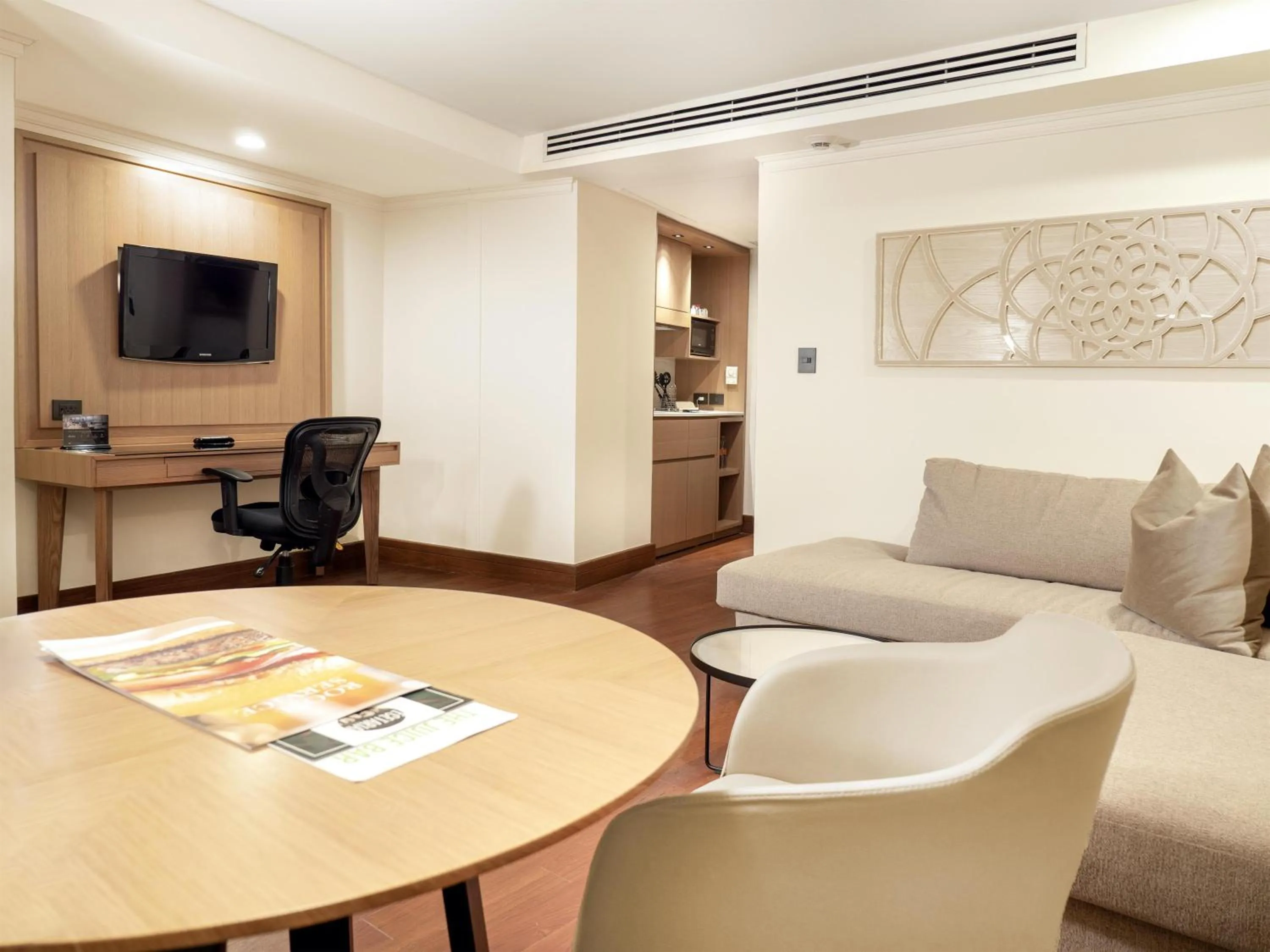 Living room in MS Milenium Monterrey Curio Collection by Hilton