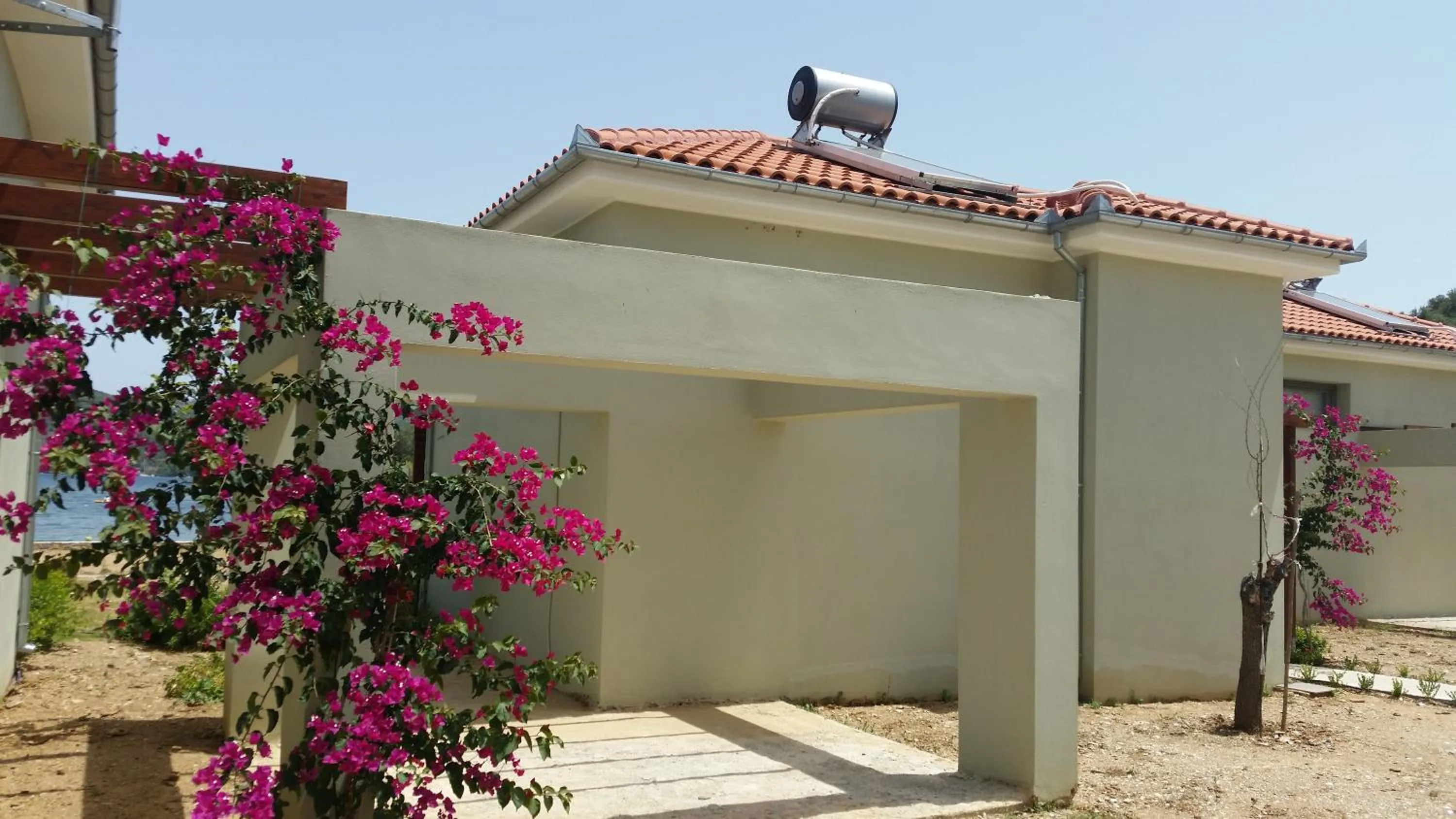 Property building in Thea Houses