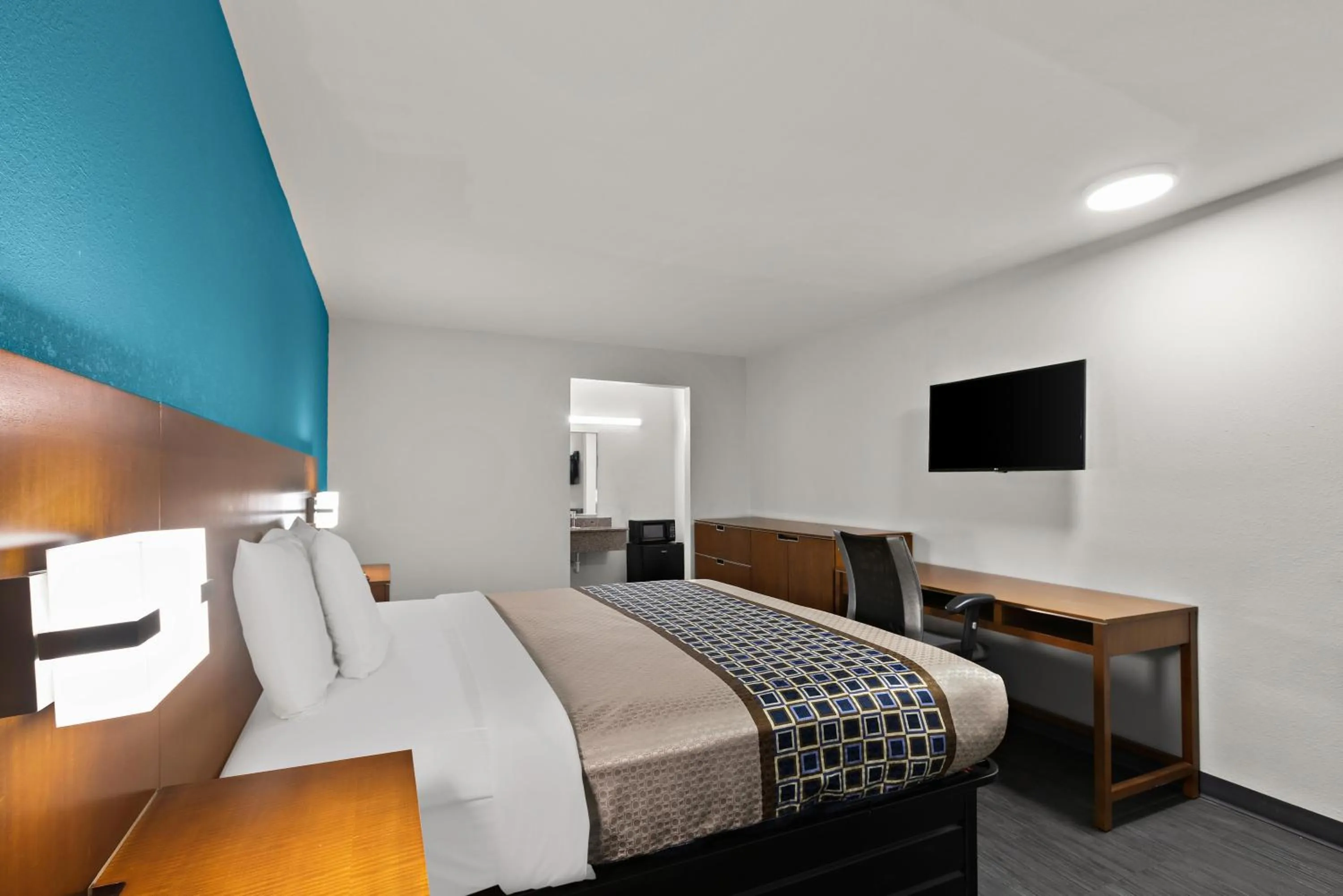 Bed in Rodeway Inn Commerce