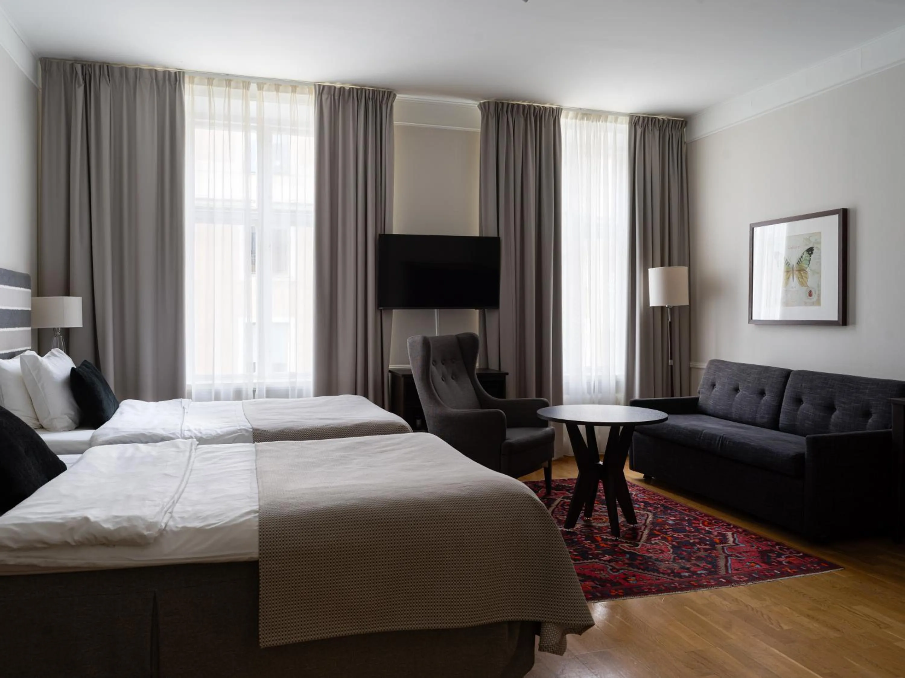 Living room, Bed in Elite Stora Hotellet Örebro