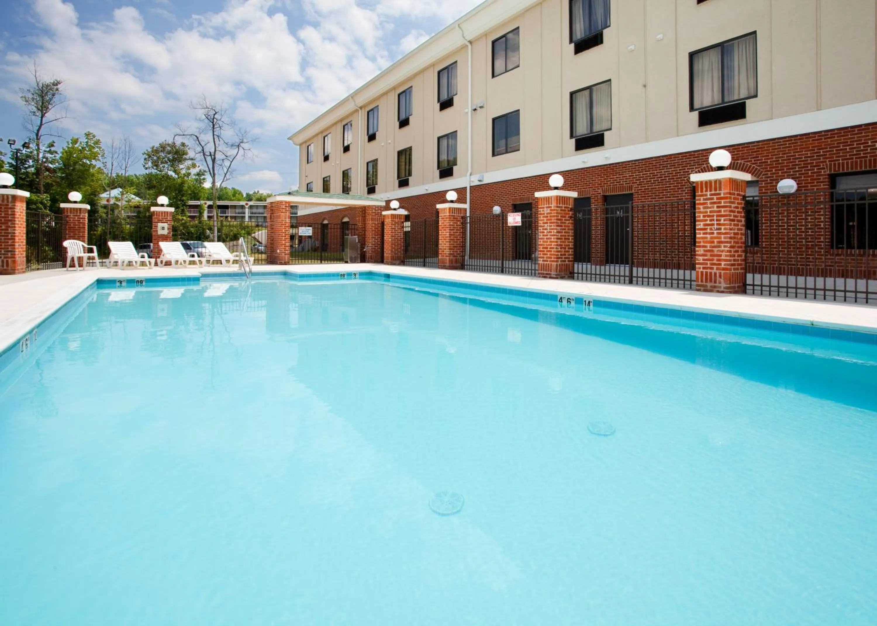 Swimming pool in Holiday Inn Express Hotel & Suites Greensboro-East by IHG