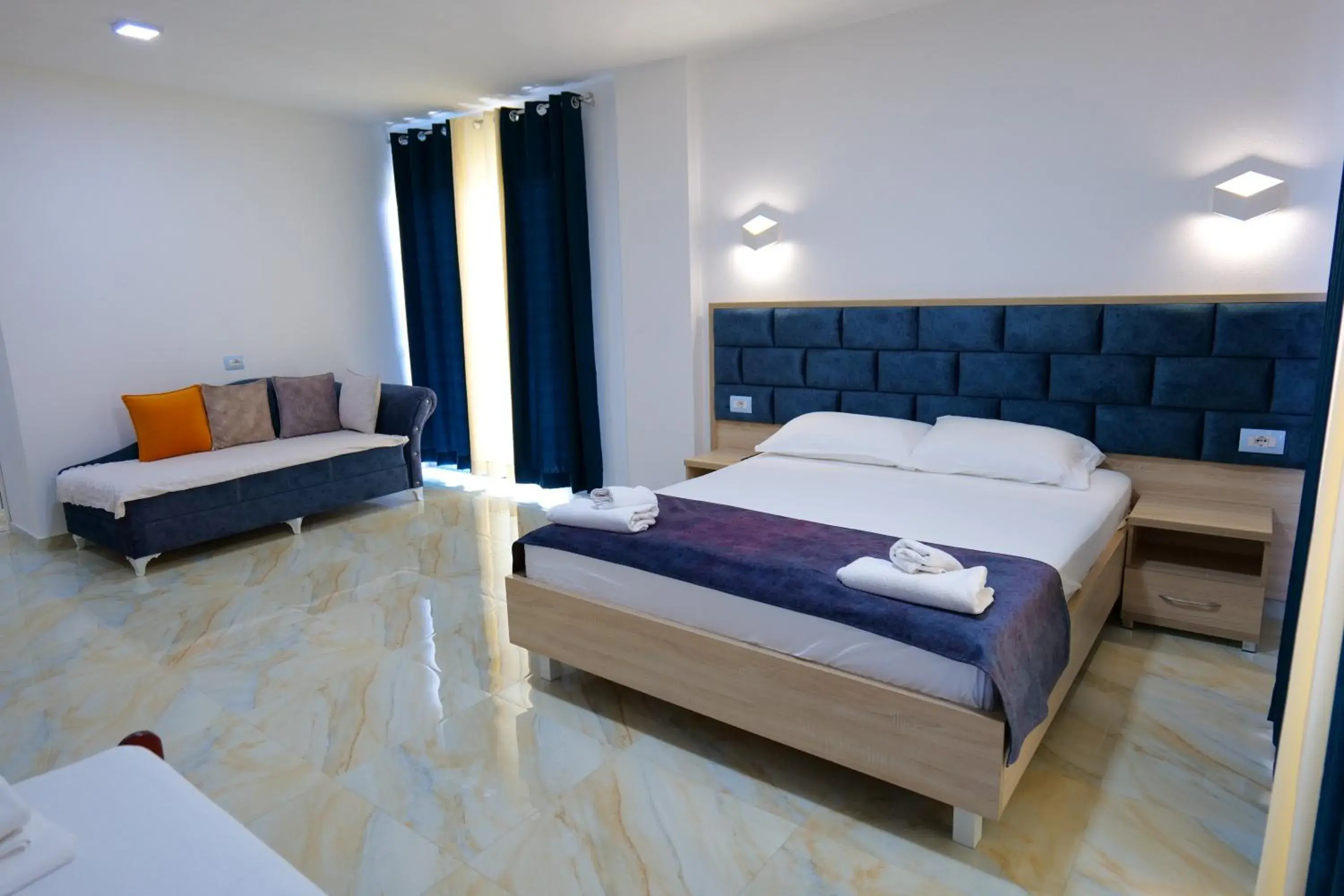 Deluxe Triple Room with Sea View in Hotel Vathi Deluxe Triple Room with Sea View in Hotel Vathi