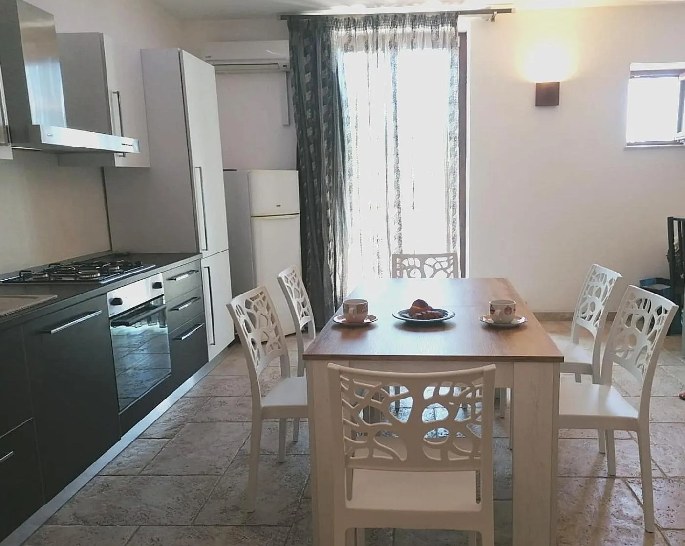 Kitchen or kitchenette in Casale Salento