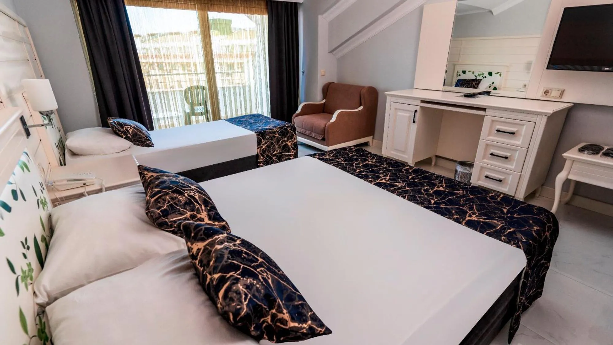 Bed in Rox Resort Hotel