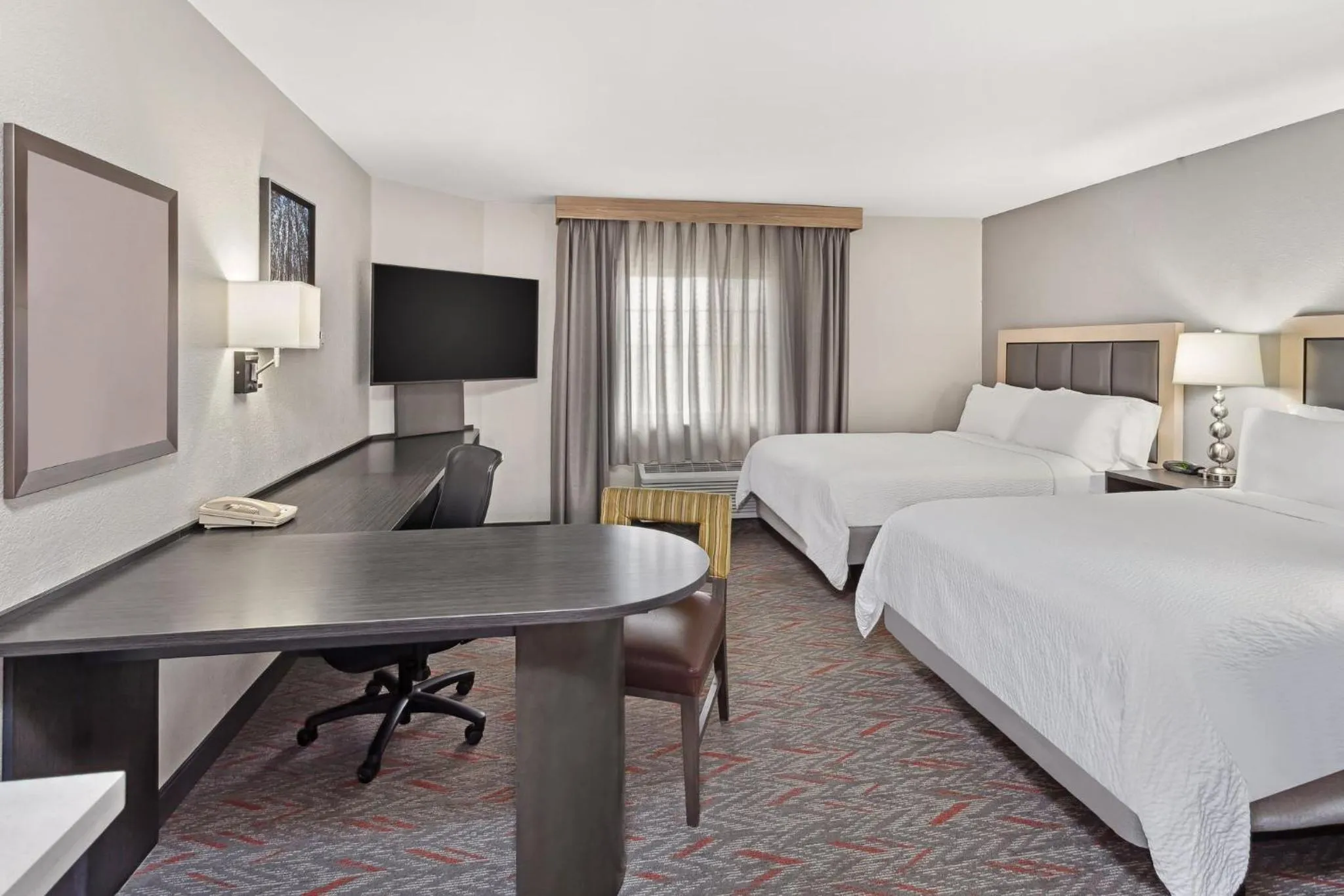 Photo of the whole room, Bed in Candlewood Suites Appleton by IHG