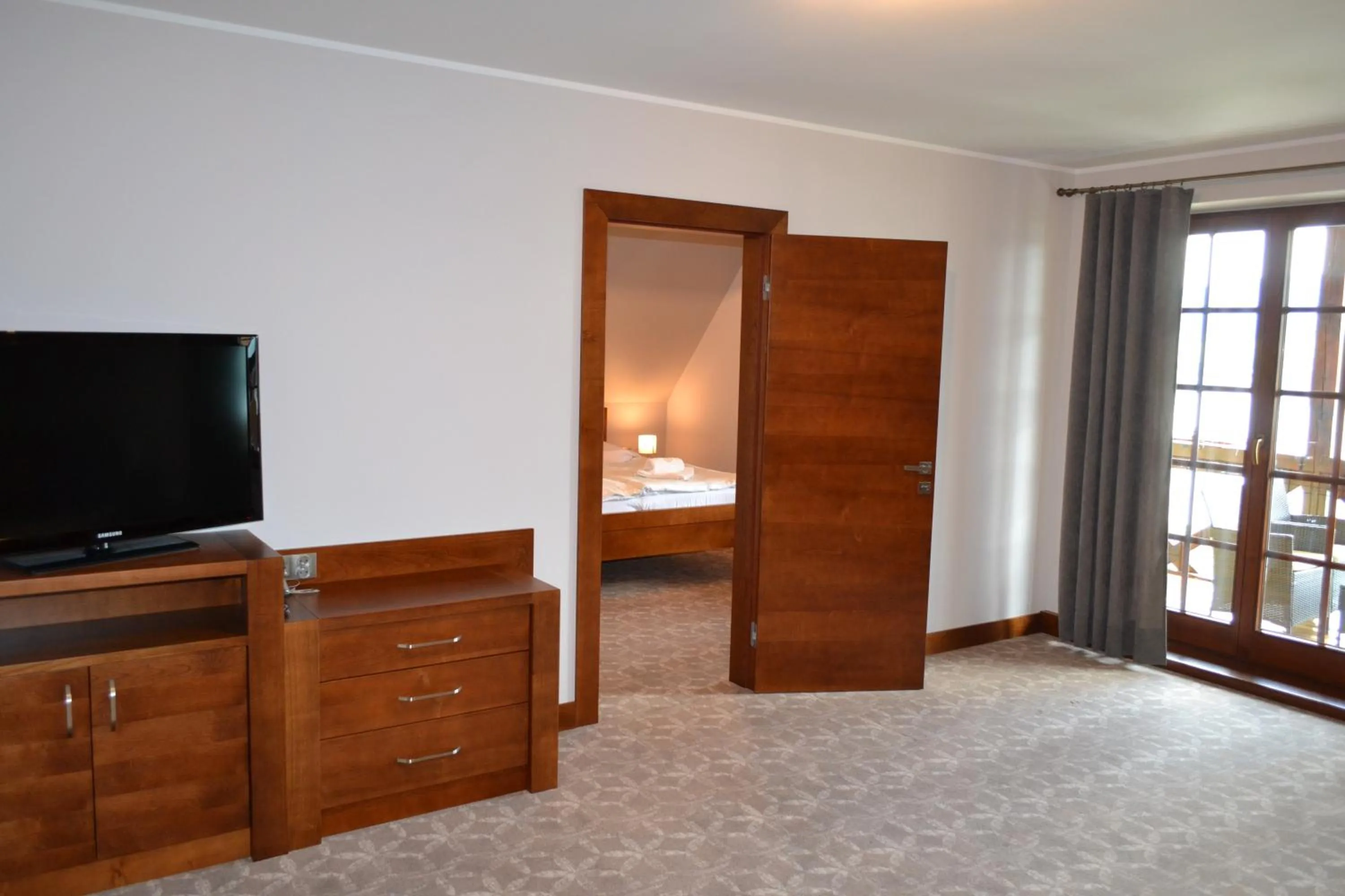 Communal lounge/ TV room in Hotel LOKIS